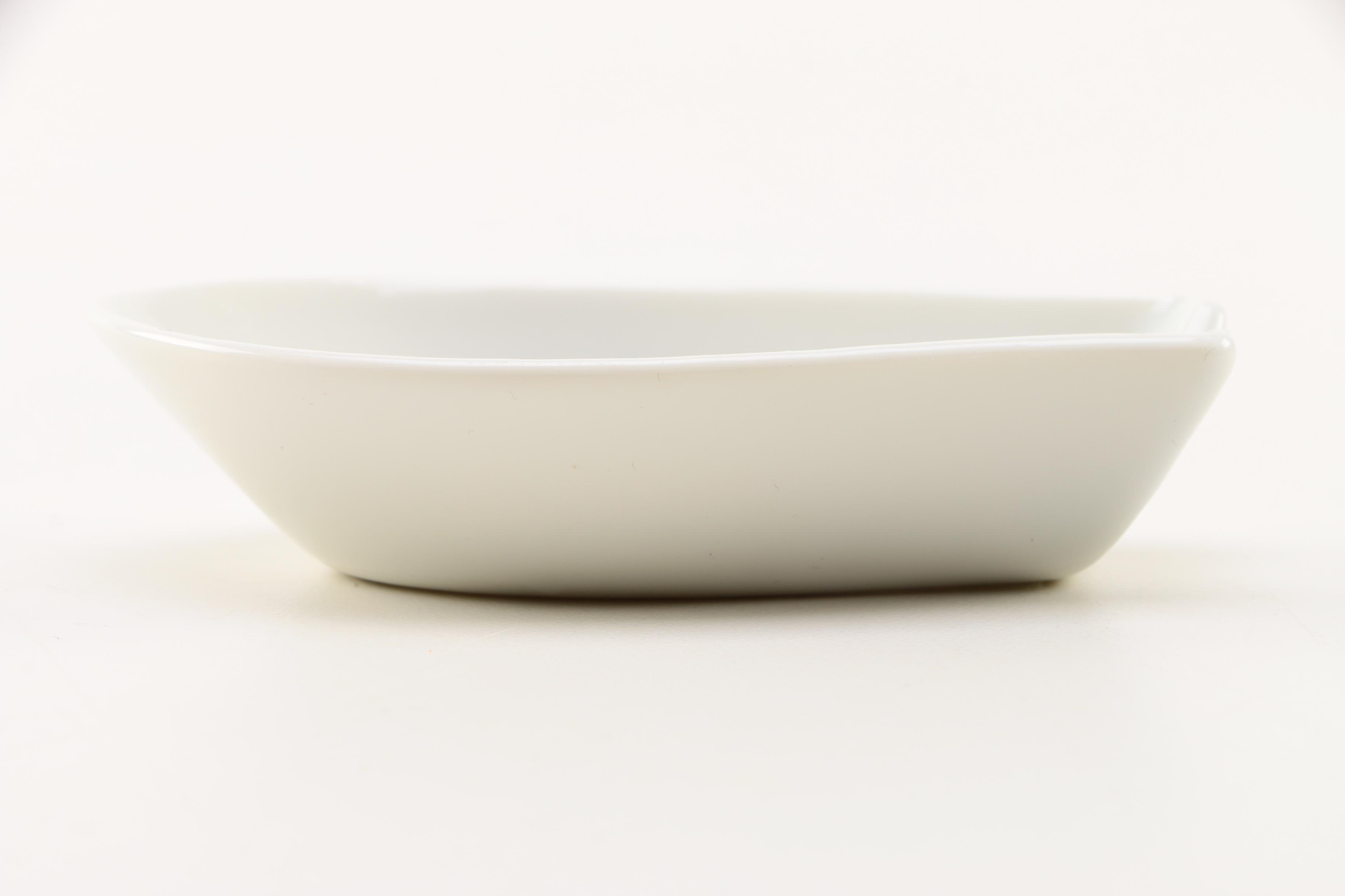 Group of Four Asian Porcelain Spoon Rests