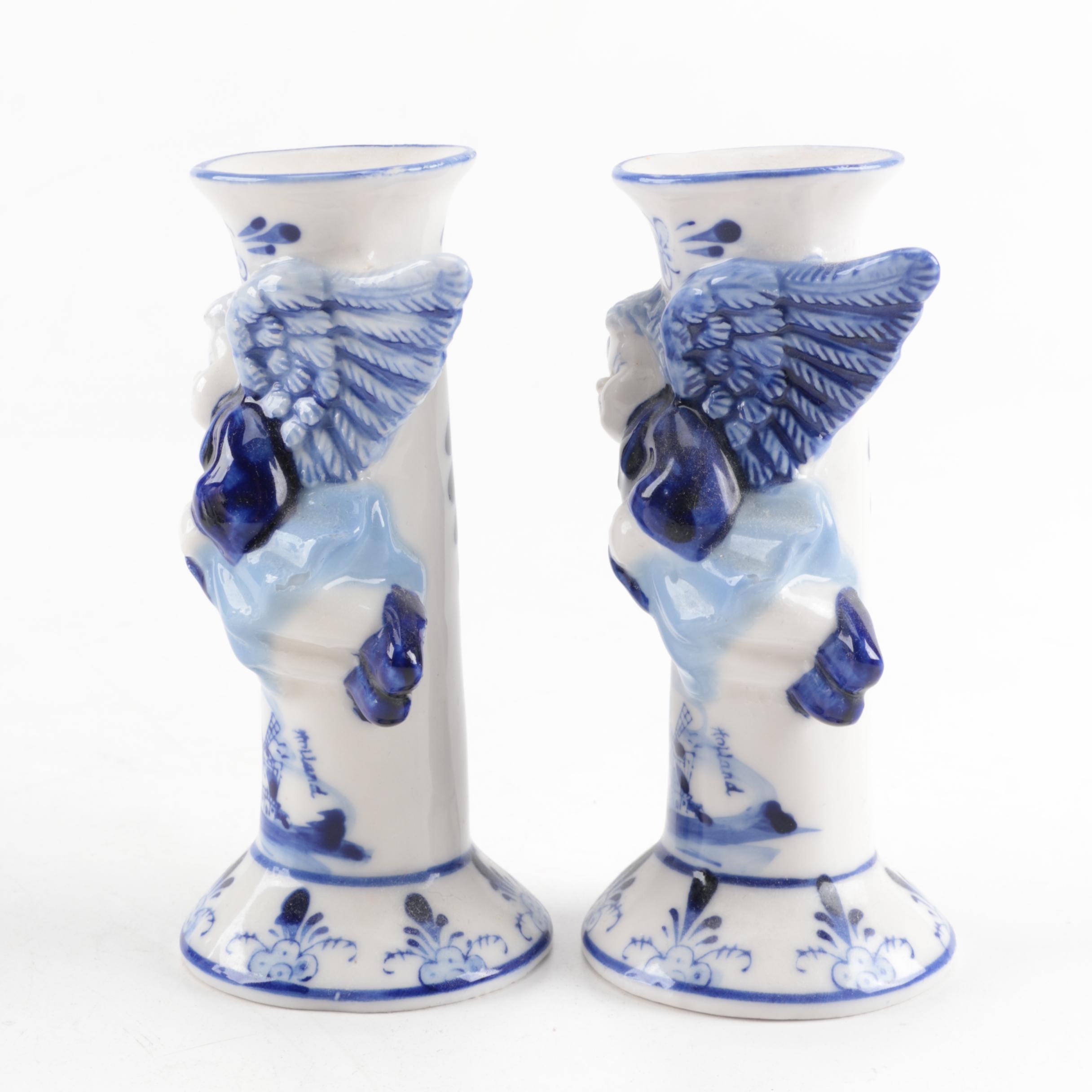 Four White and Blue Ceramic Candle Holders