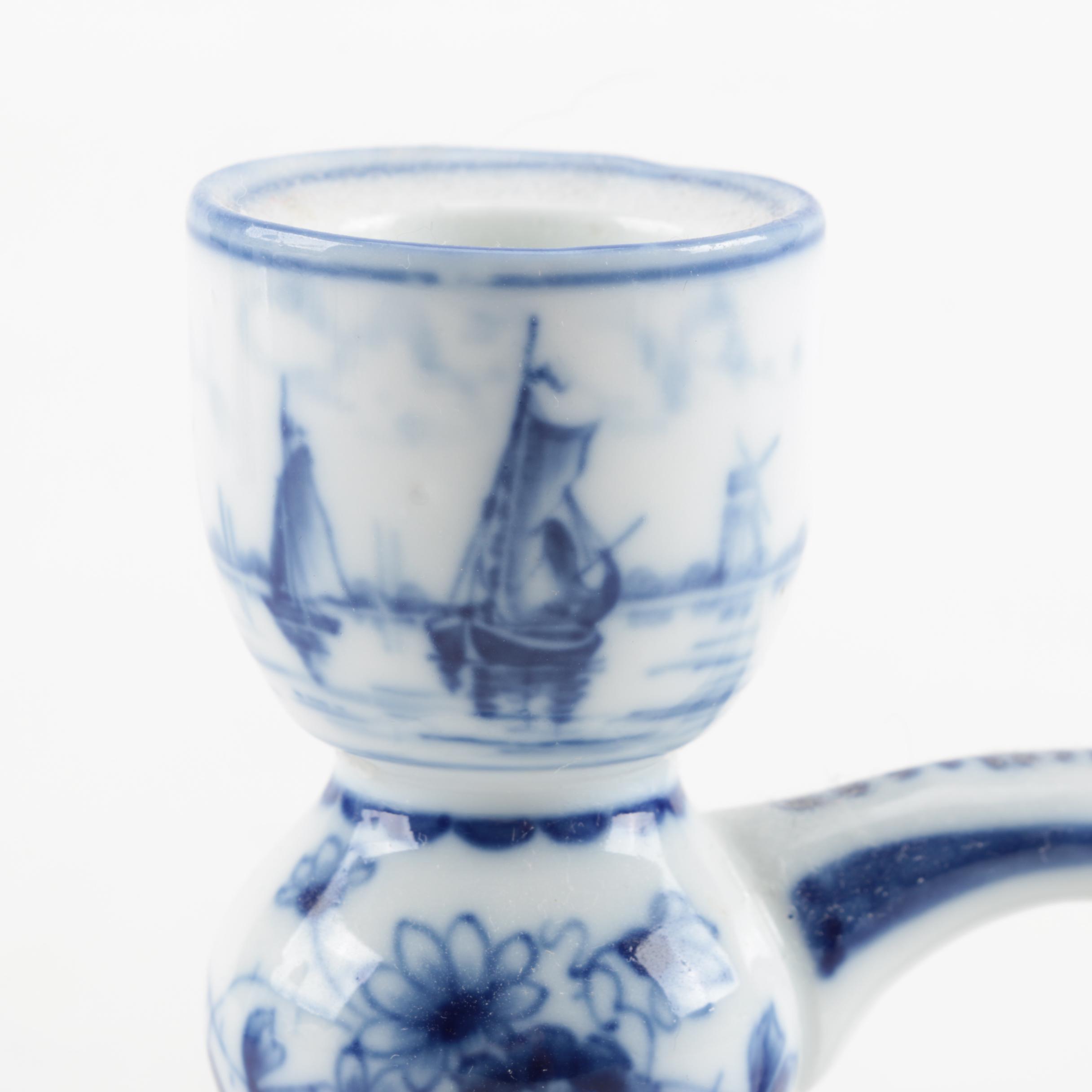 Four White and Blue Ceramic Candle Holders