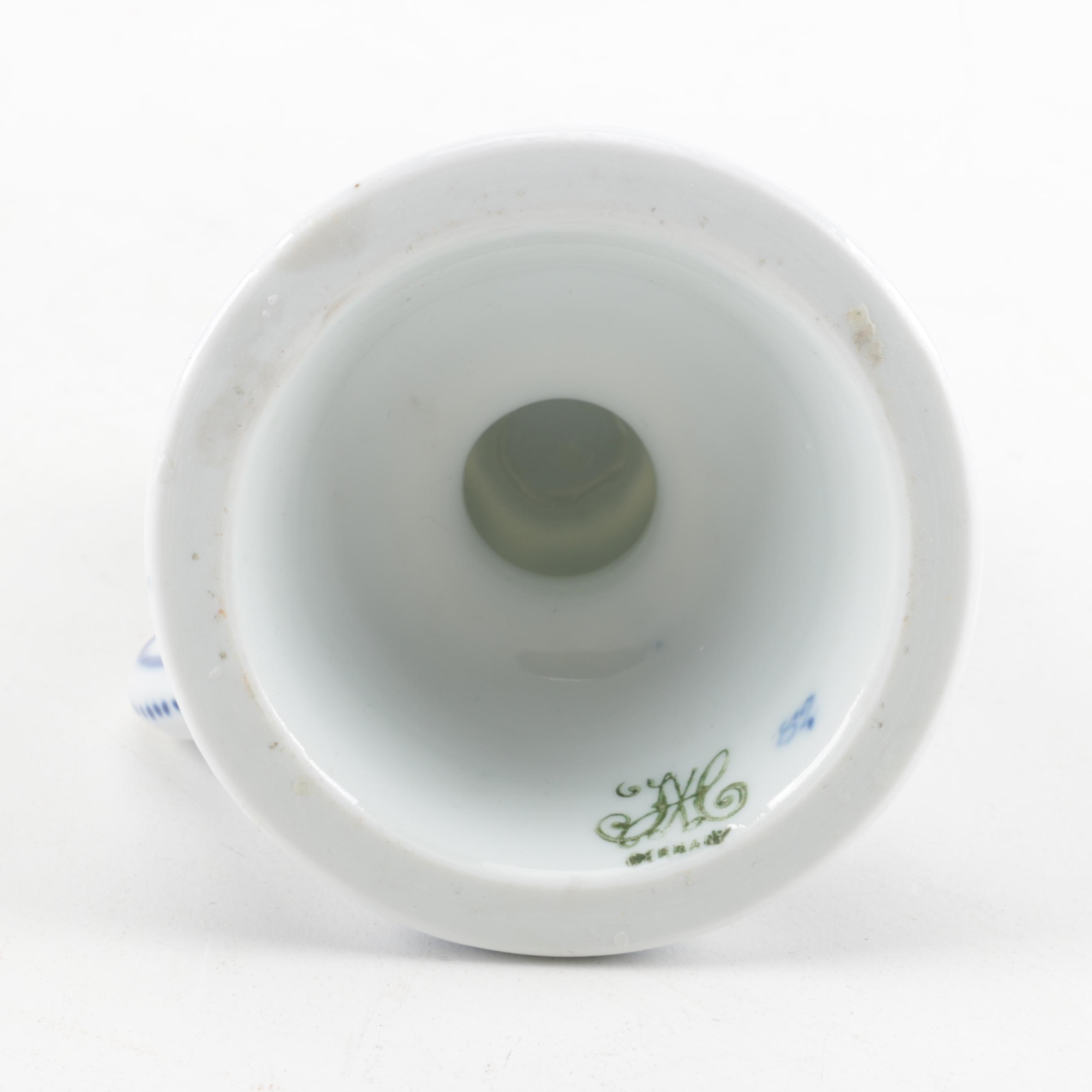 Four White and Blue Ceramic Candle Holders