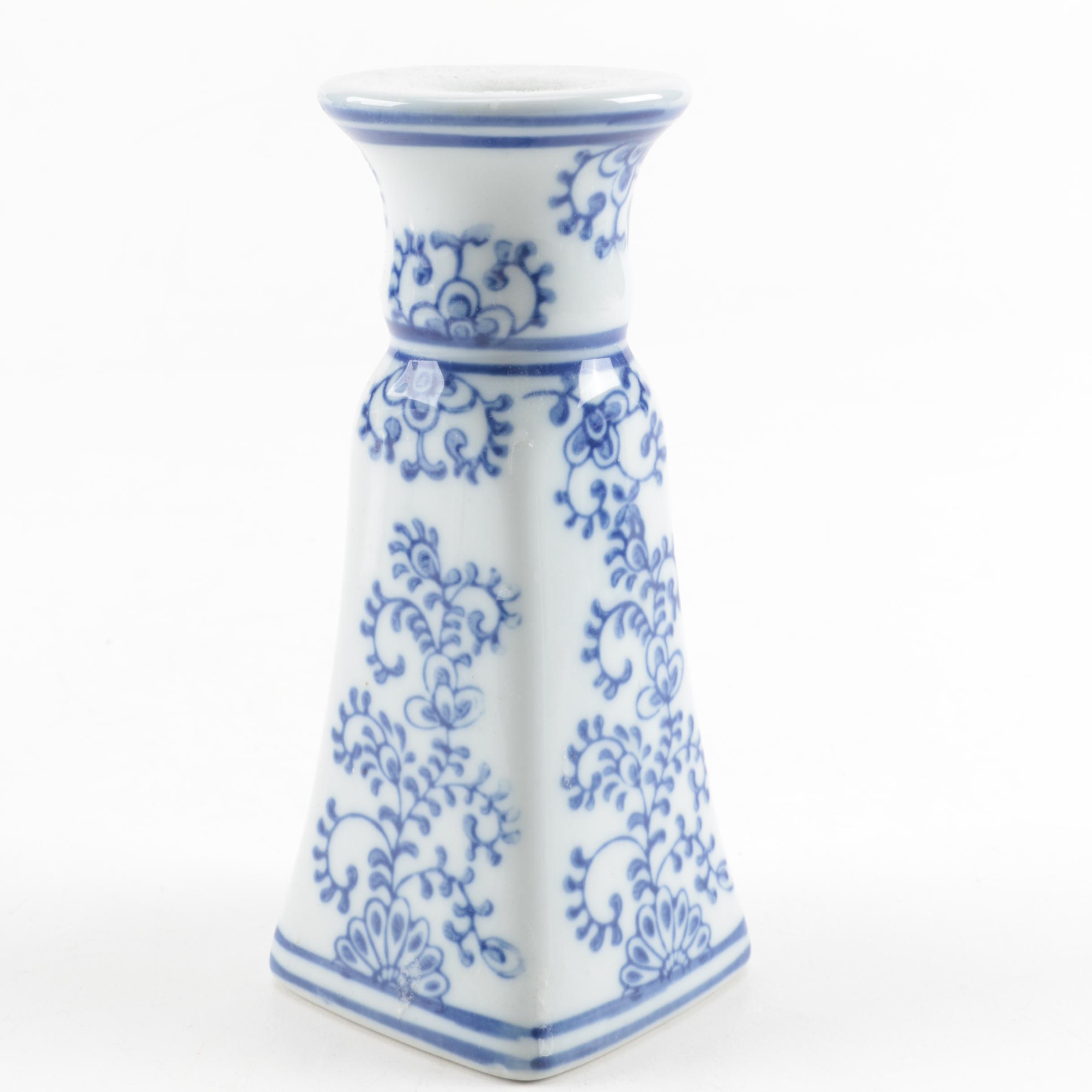 Four White and Blue Ceramic Candle Holders
