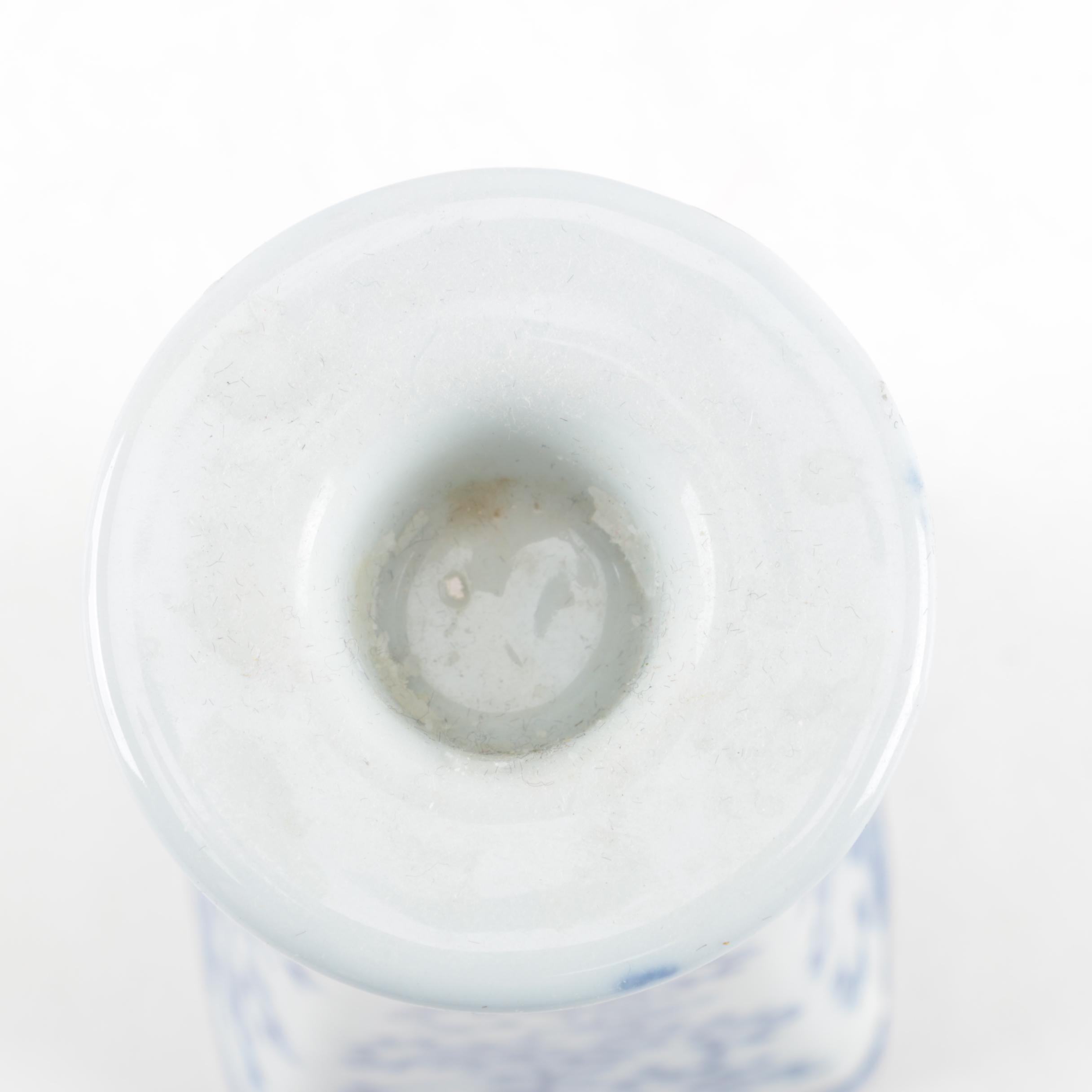 Four White and Blue Ceramic Candle Holders