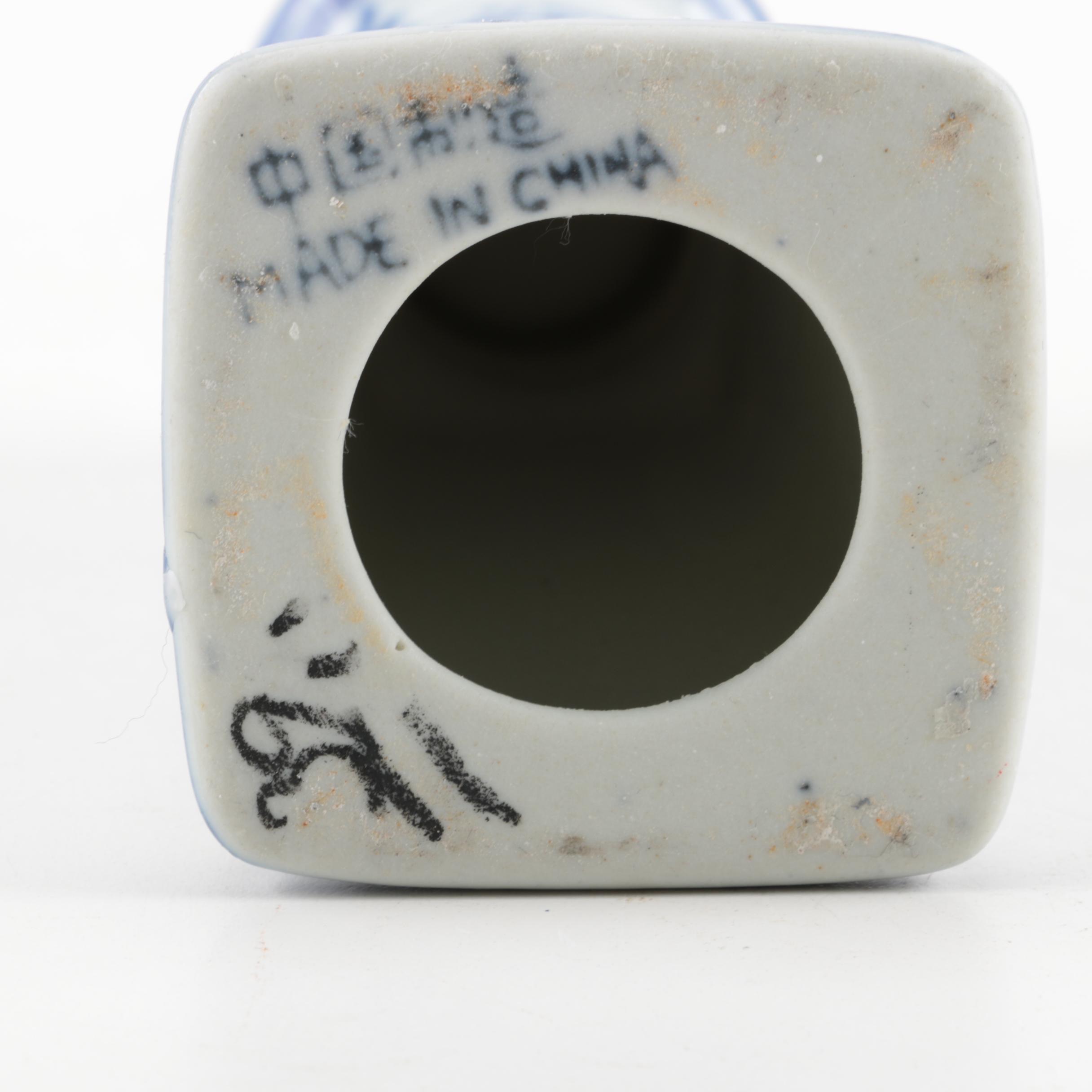 Four White and Blue Ceramic Candle Holders