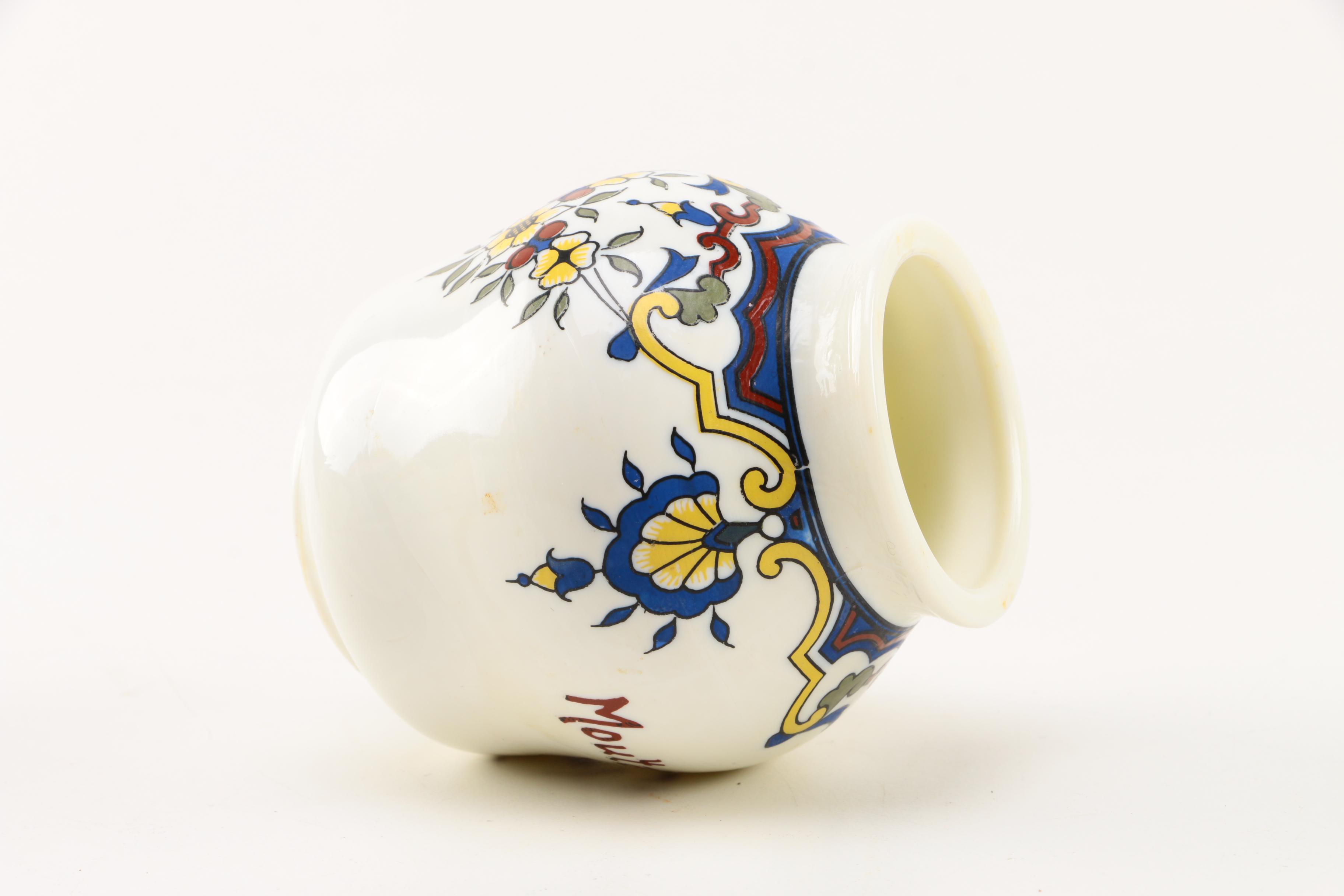 Four White Floral Ceramic Jars