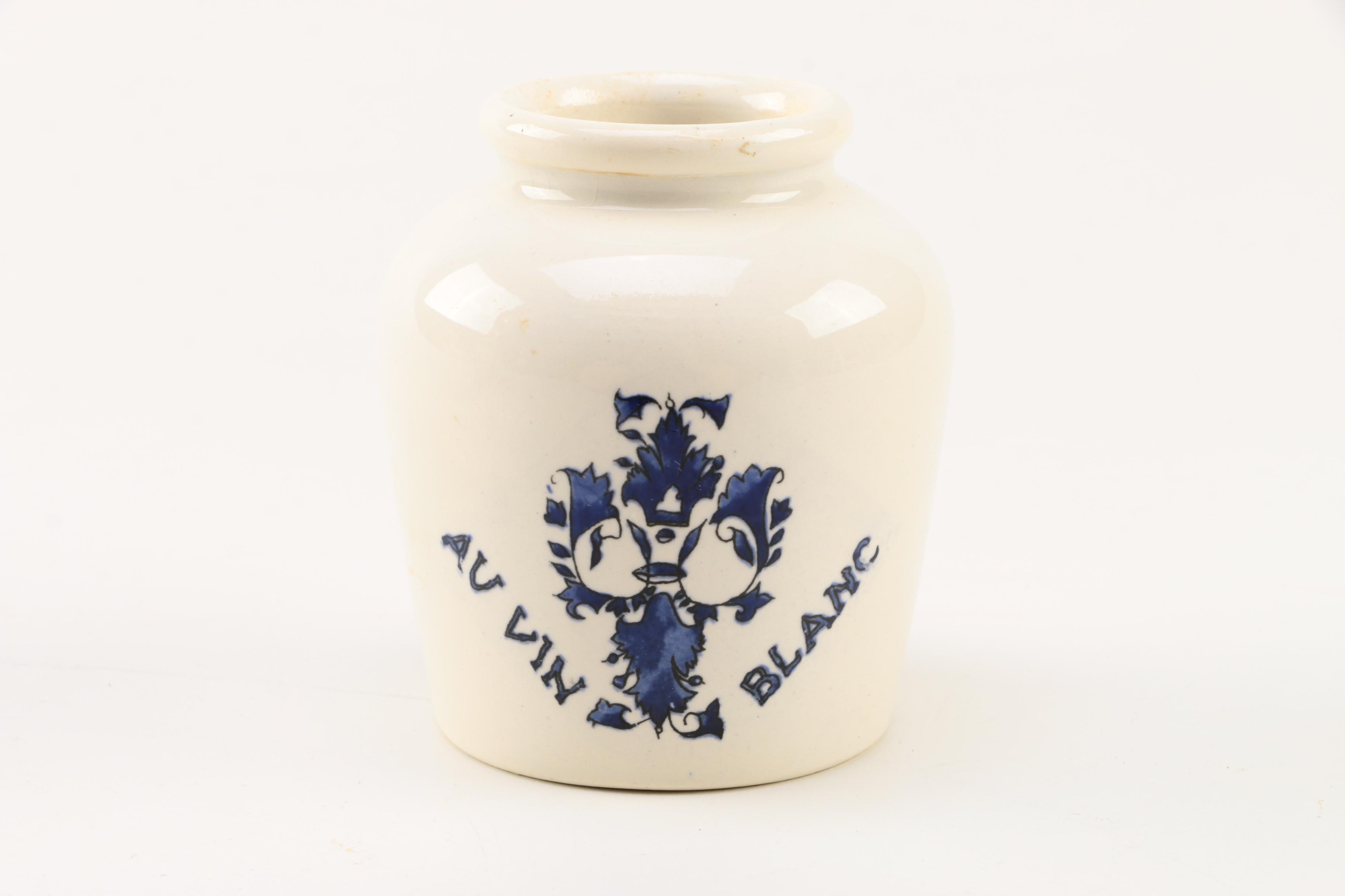 Four White Floral Ceramic Jars