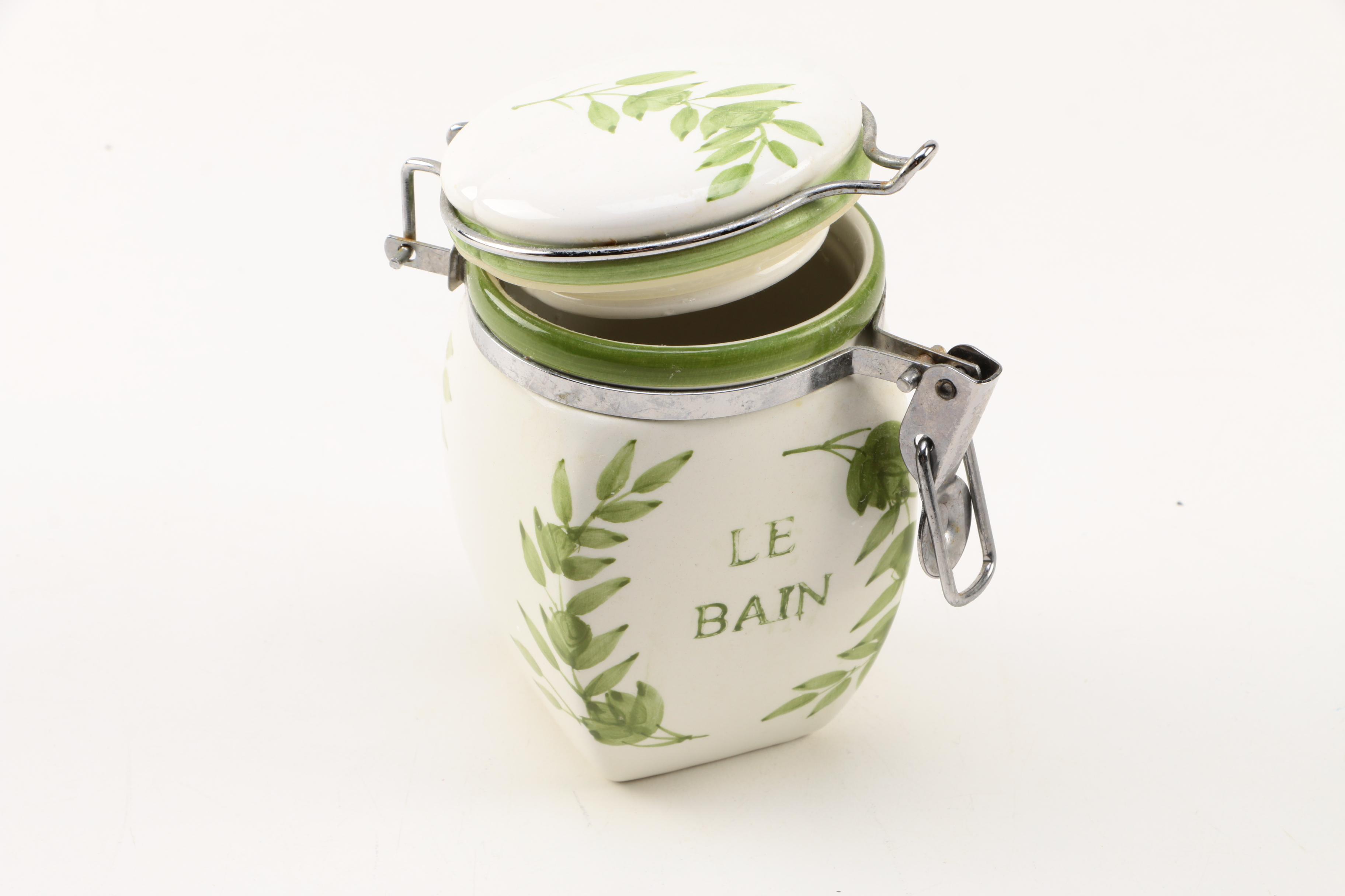 Four White Floral Ceramic Jars