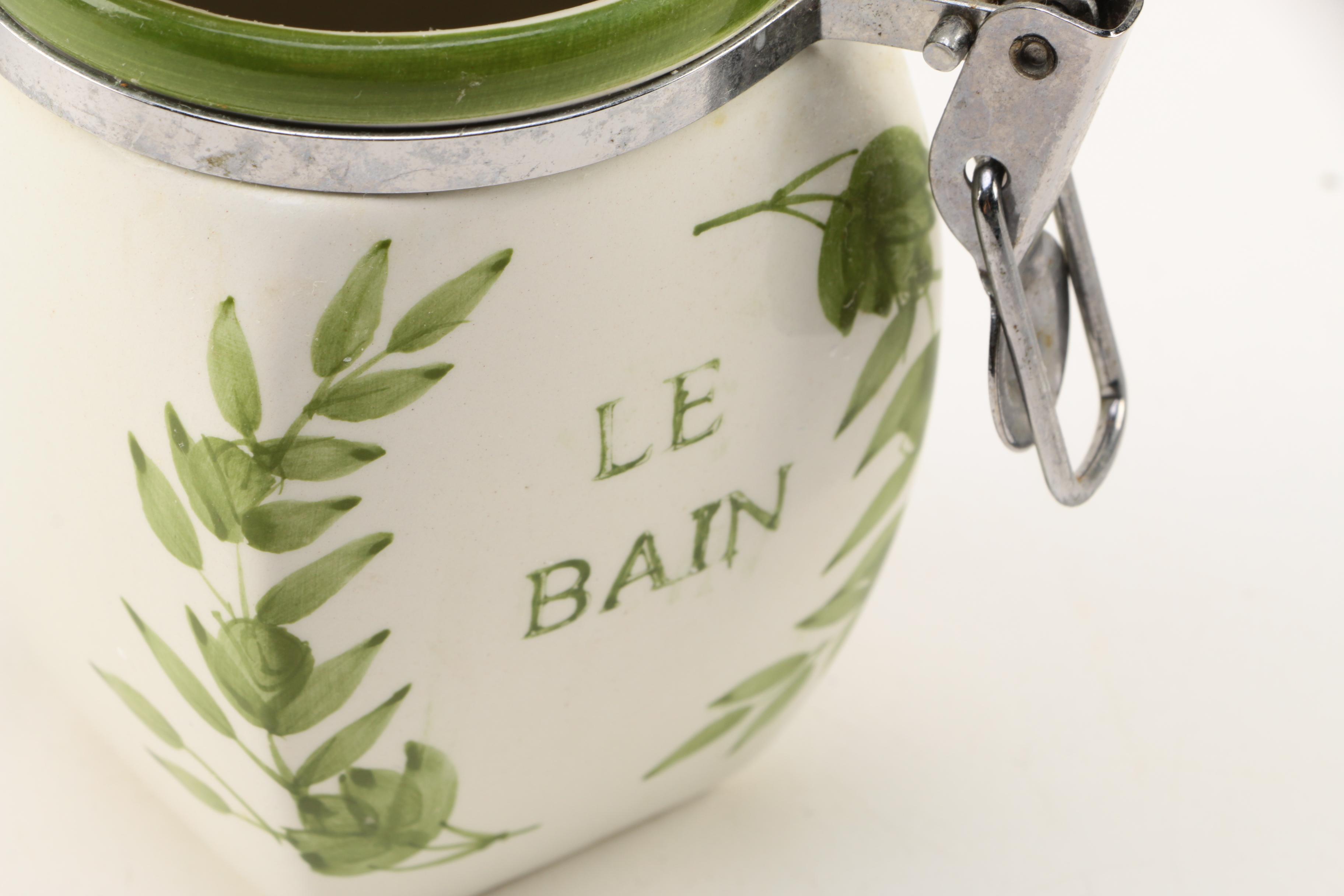 Four White Floral Ceramic Jars