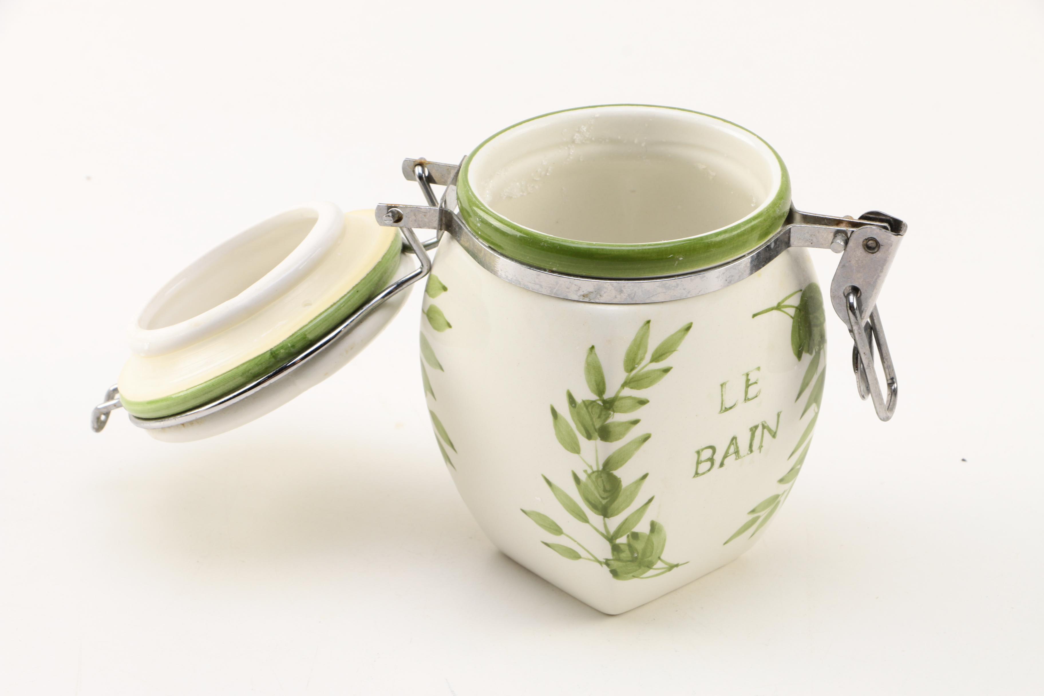 Four White Floral Ceramic Jars