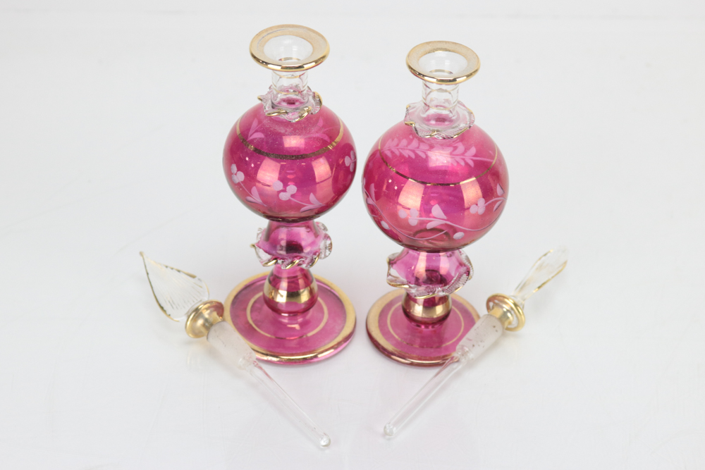 Eleven Colored Glass Perfume Bottles