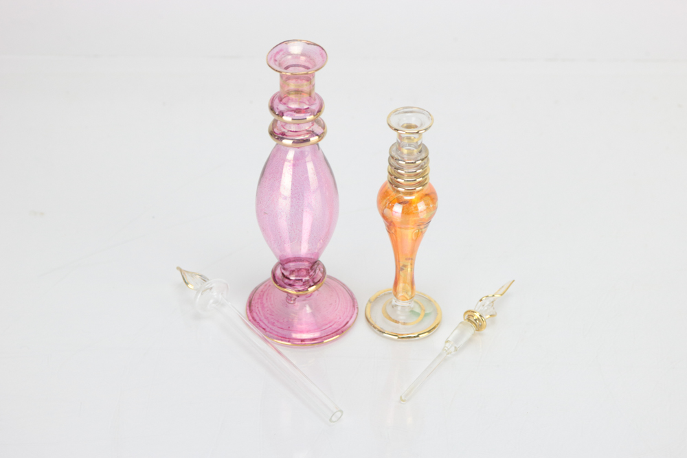 Eleven Colored Glass Perfume Bottles