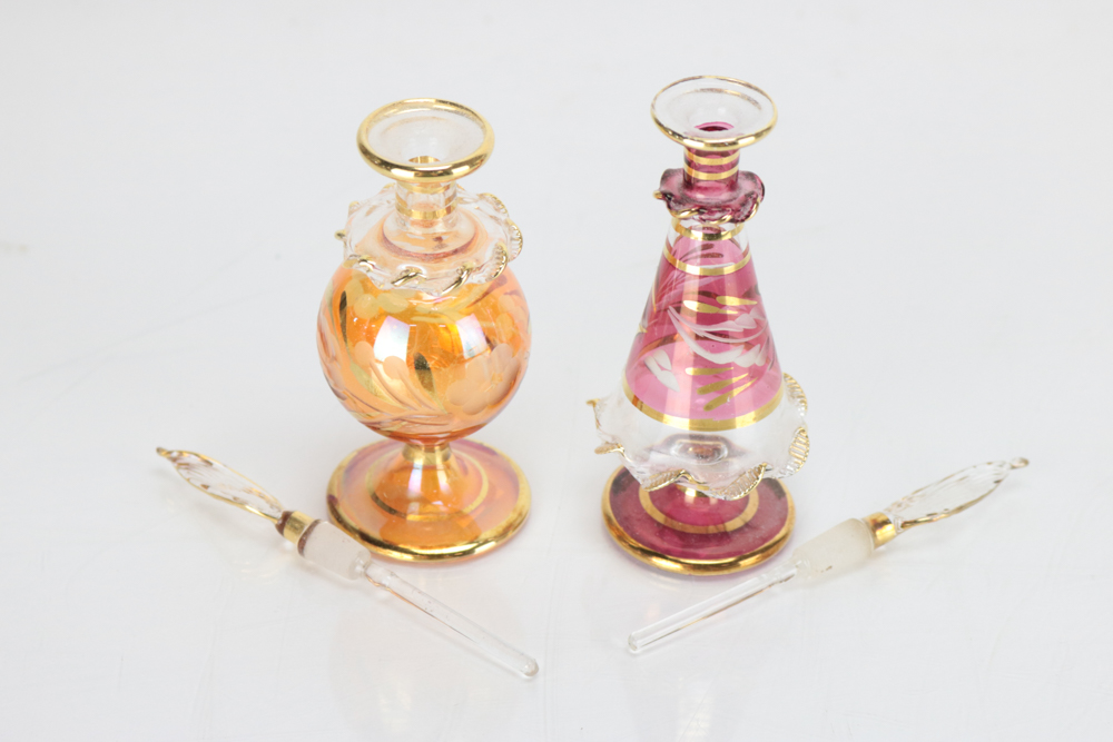Eleven Colored Glass Perfume Bottles