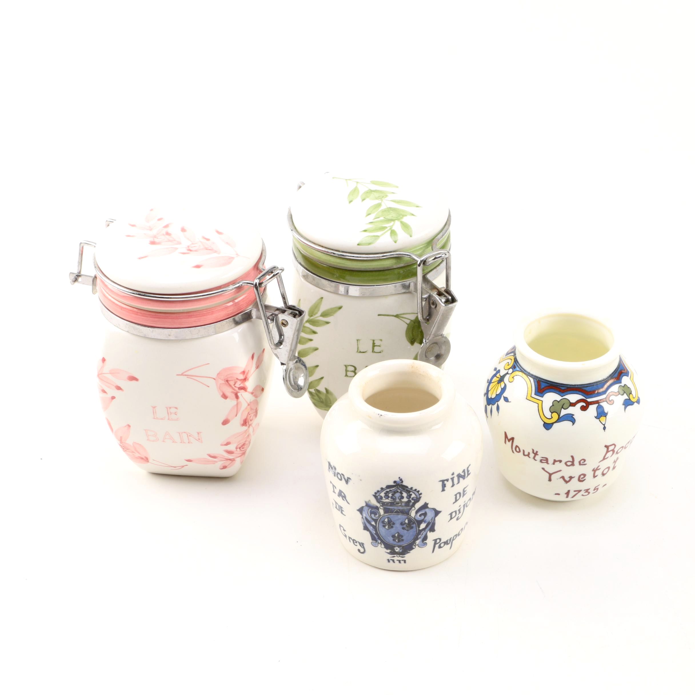 Four White Floral Ceramic Jars