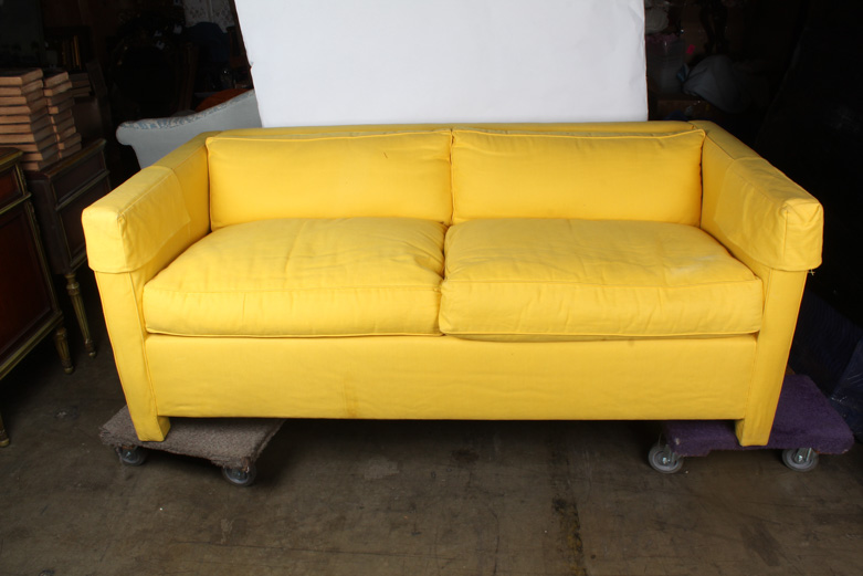 Modern Yellow Sleeper Sofa with Three Assorted Decorative Pillows