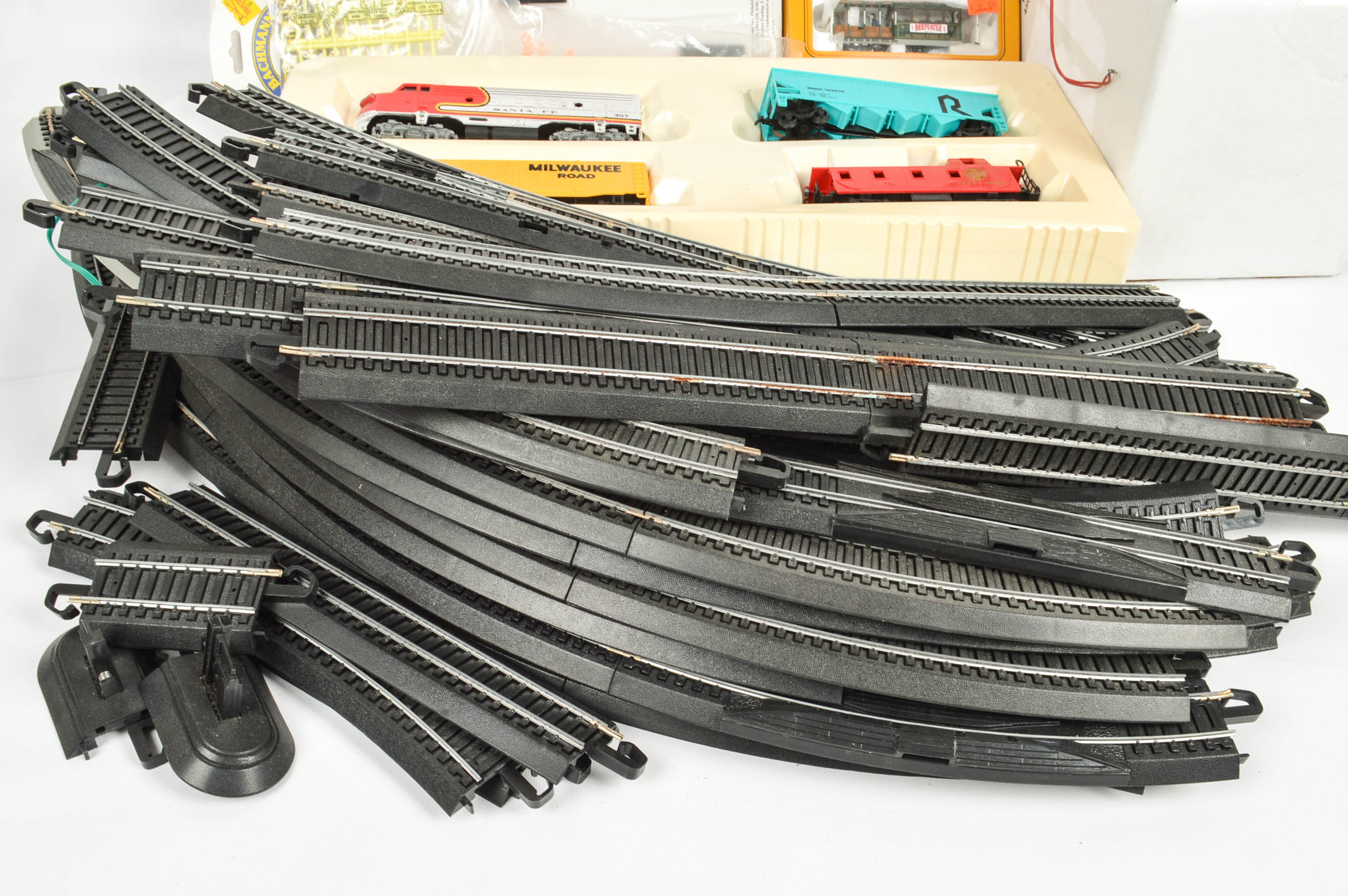 Assorted HO Gauge Train Cars and Tracks