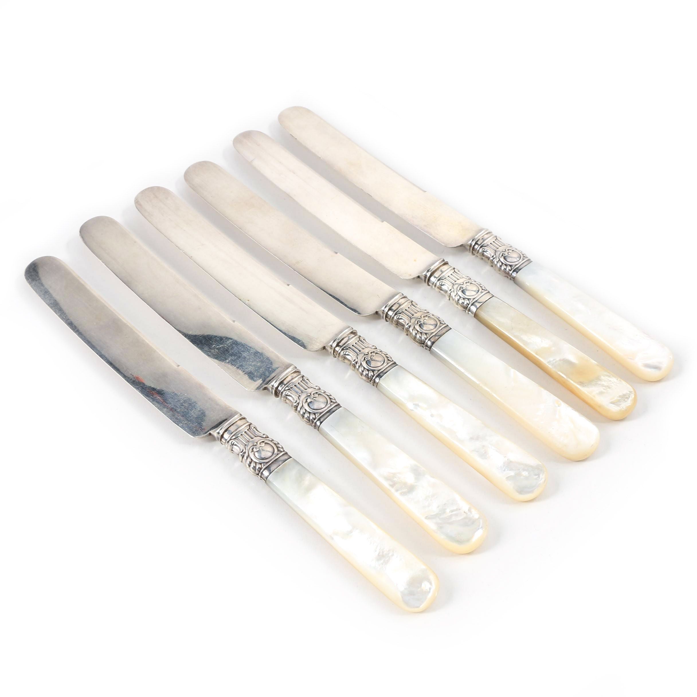 Six Mother of Pearl Handled Dessert Knives with Sterling Bolsters