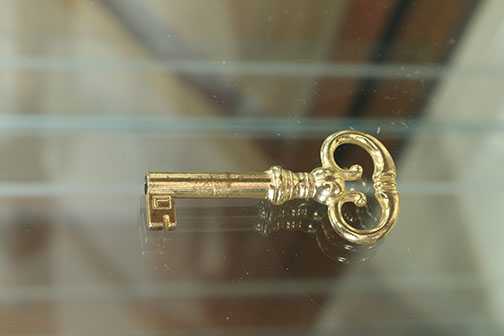 Pair of Curio Cabinets by the Jasper Cabinet Company