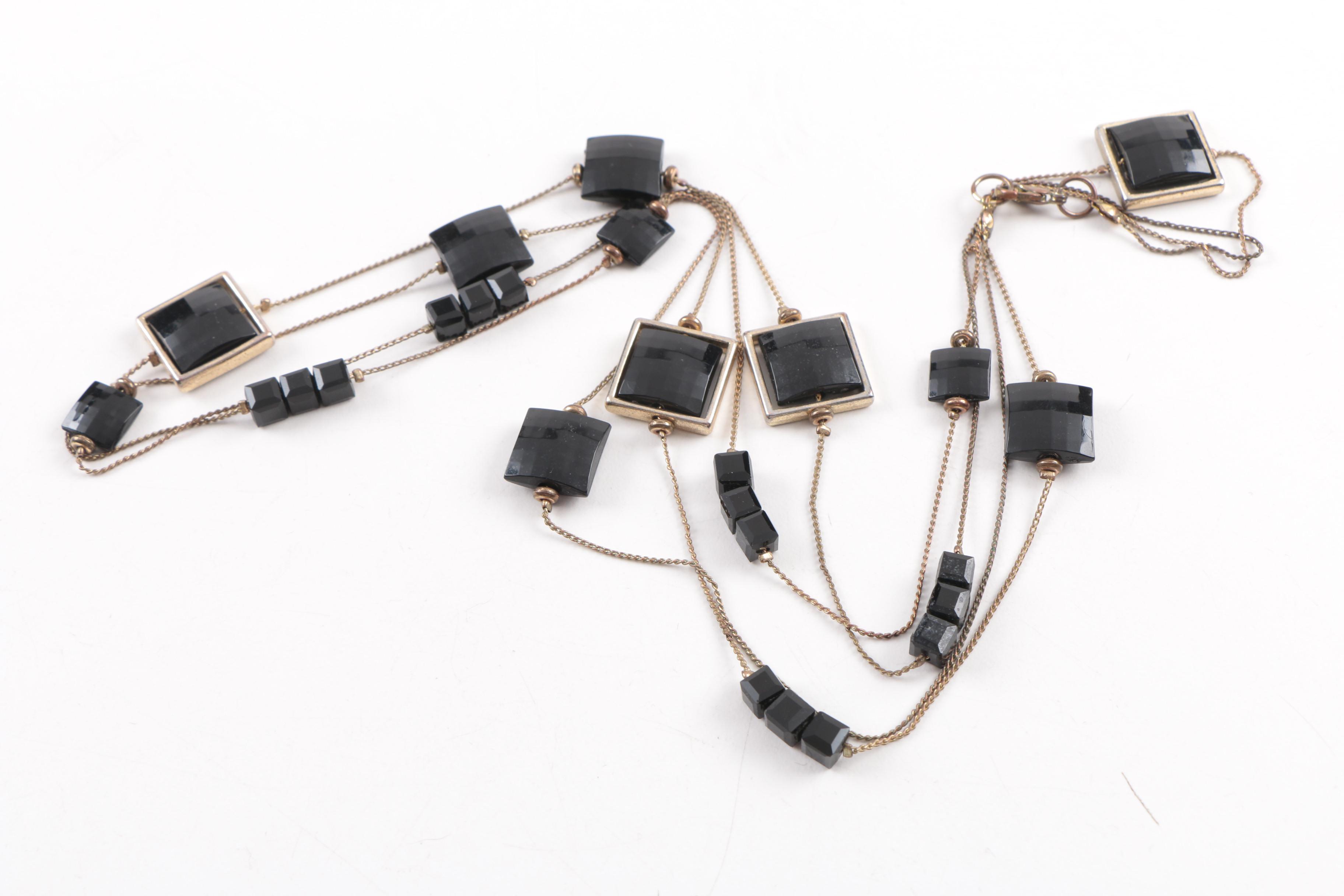 Costume Jewelry Including Amethyst and Bone