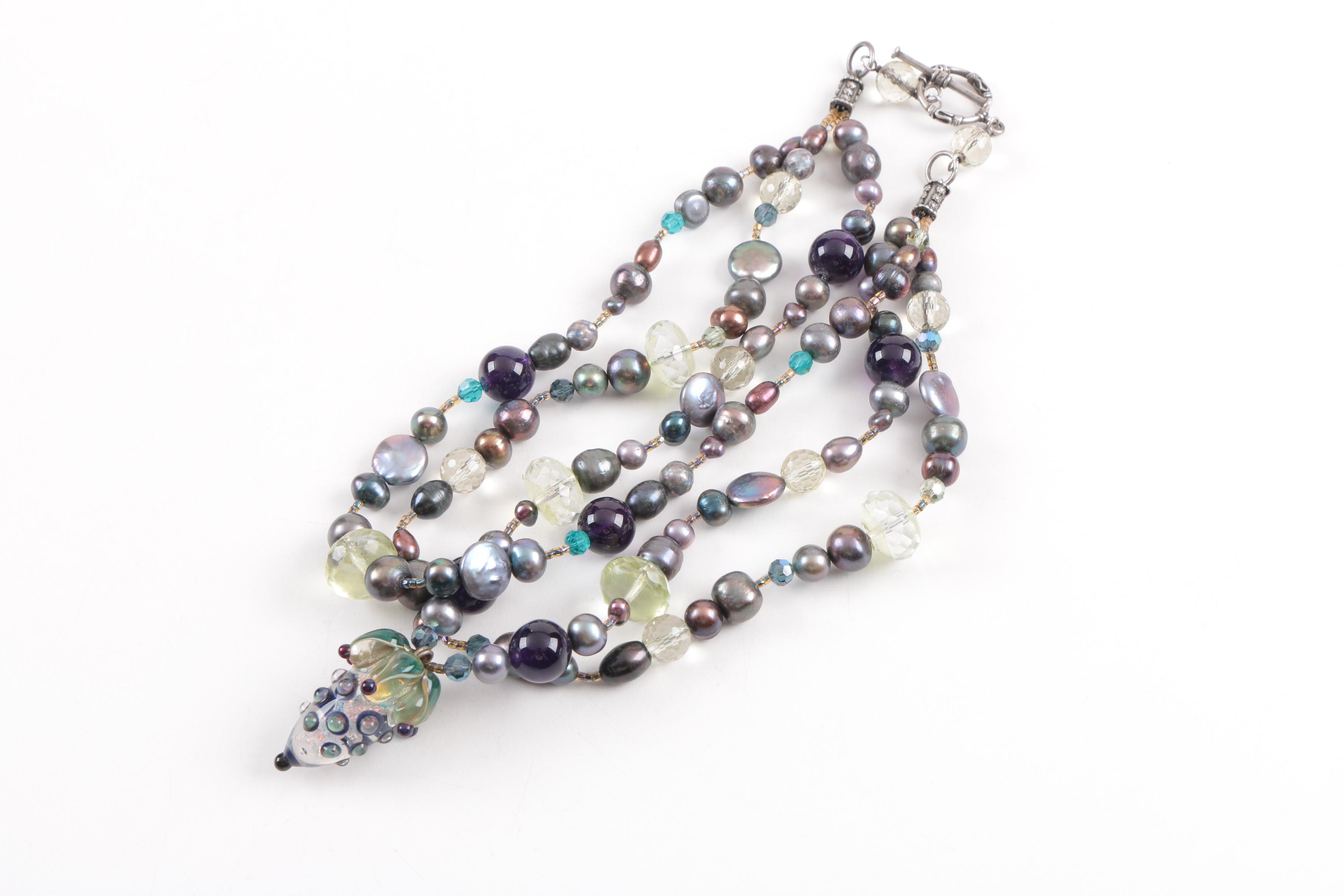 Costume Jewelry Including Amethyst and Bone