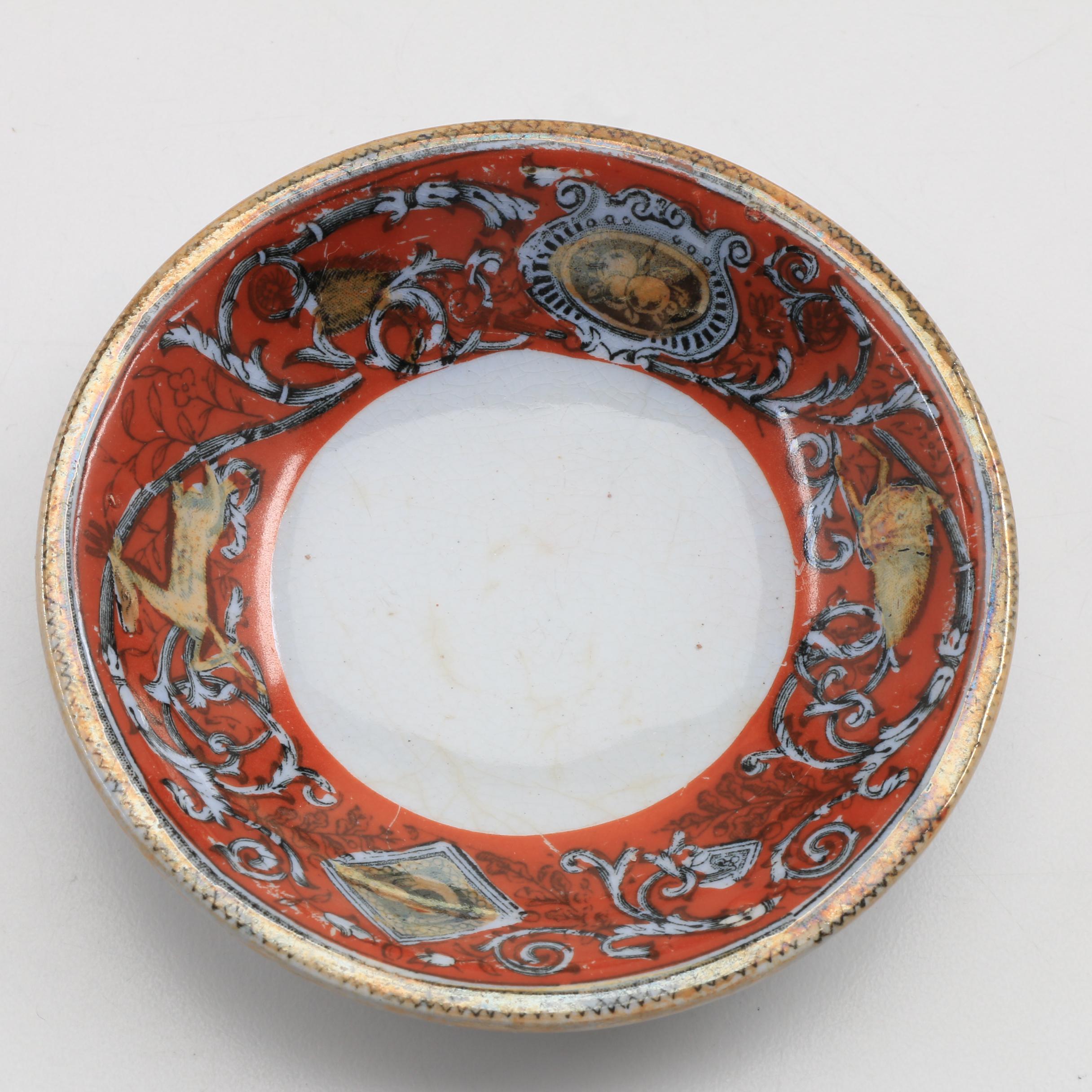 A Collection Of Over 140 Butter Pats