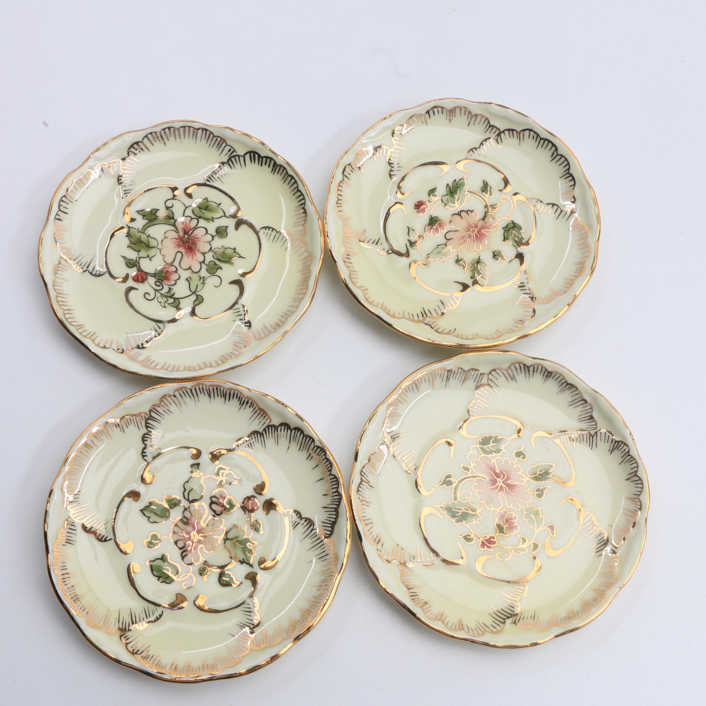 A Collection Of Over 140 Butter Pats