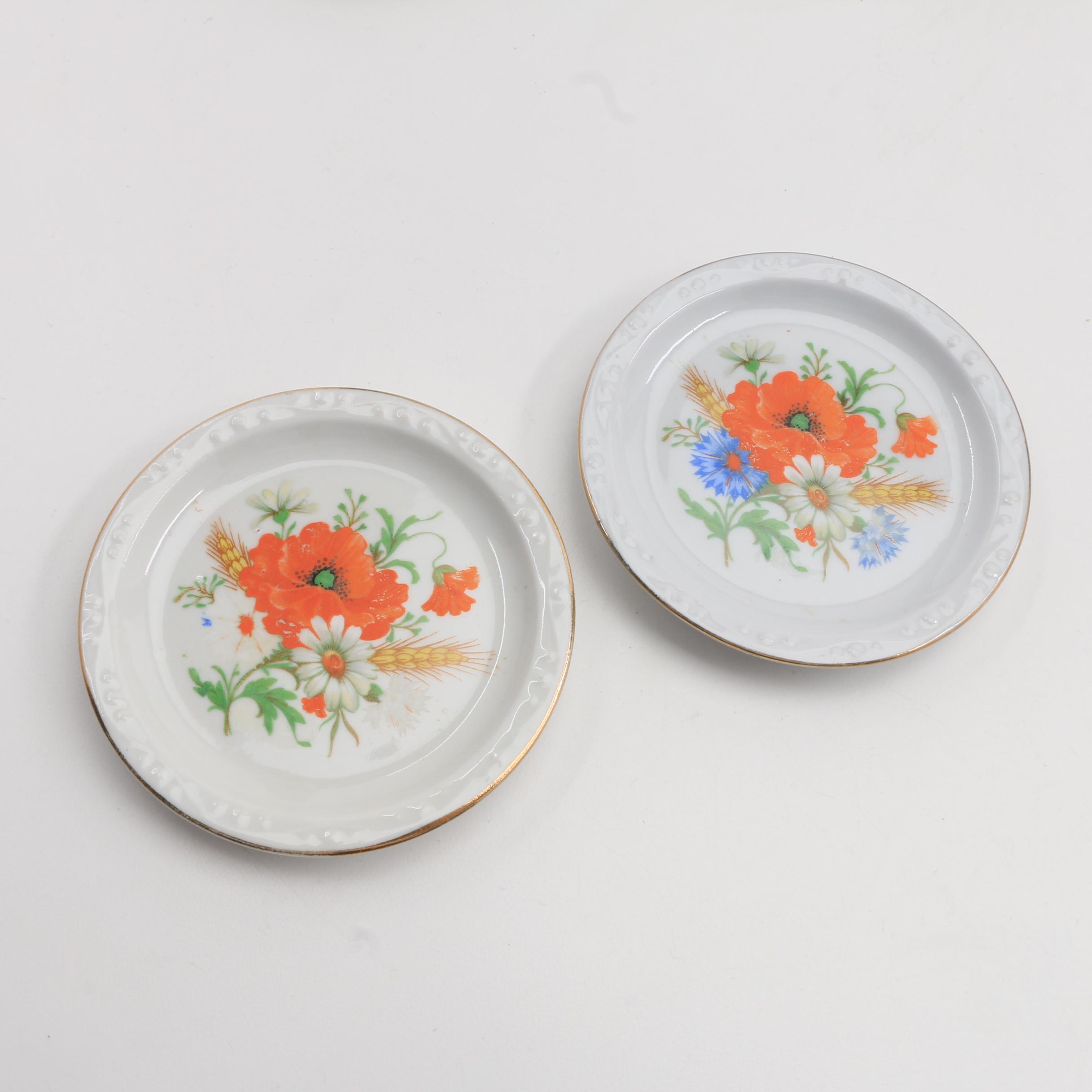 A Collection Of Over 140 Butter Pats