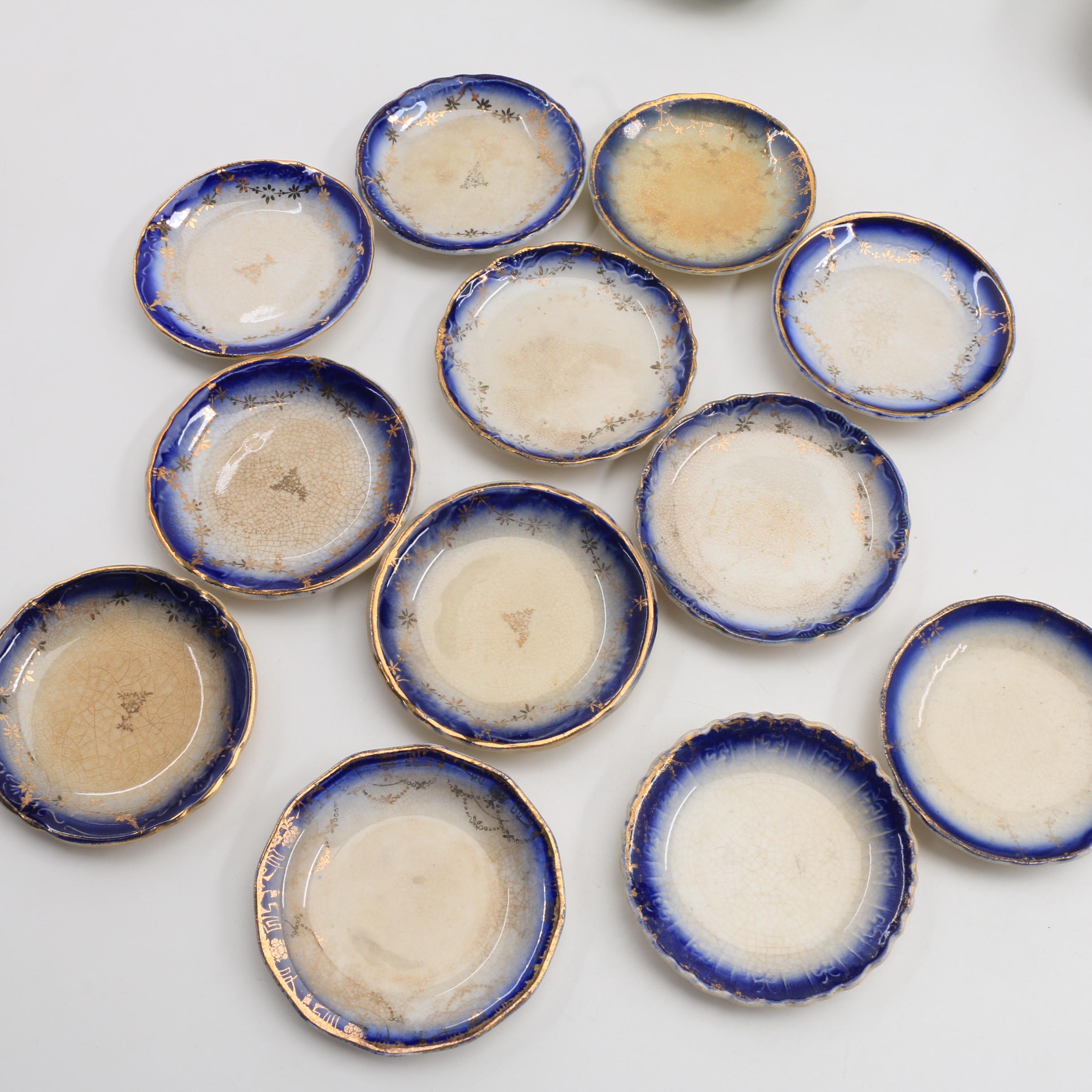 A Collection Of Over 140 Butter Pats