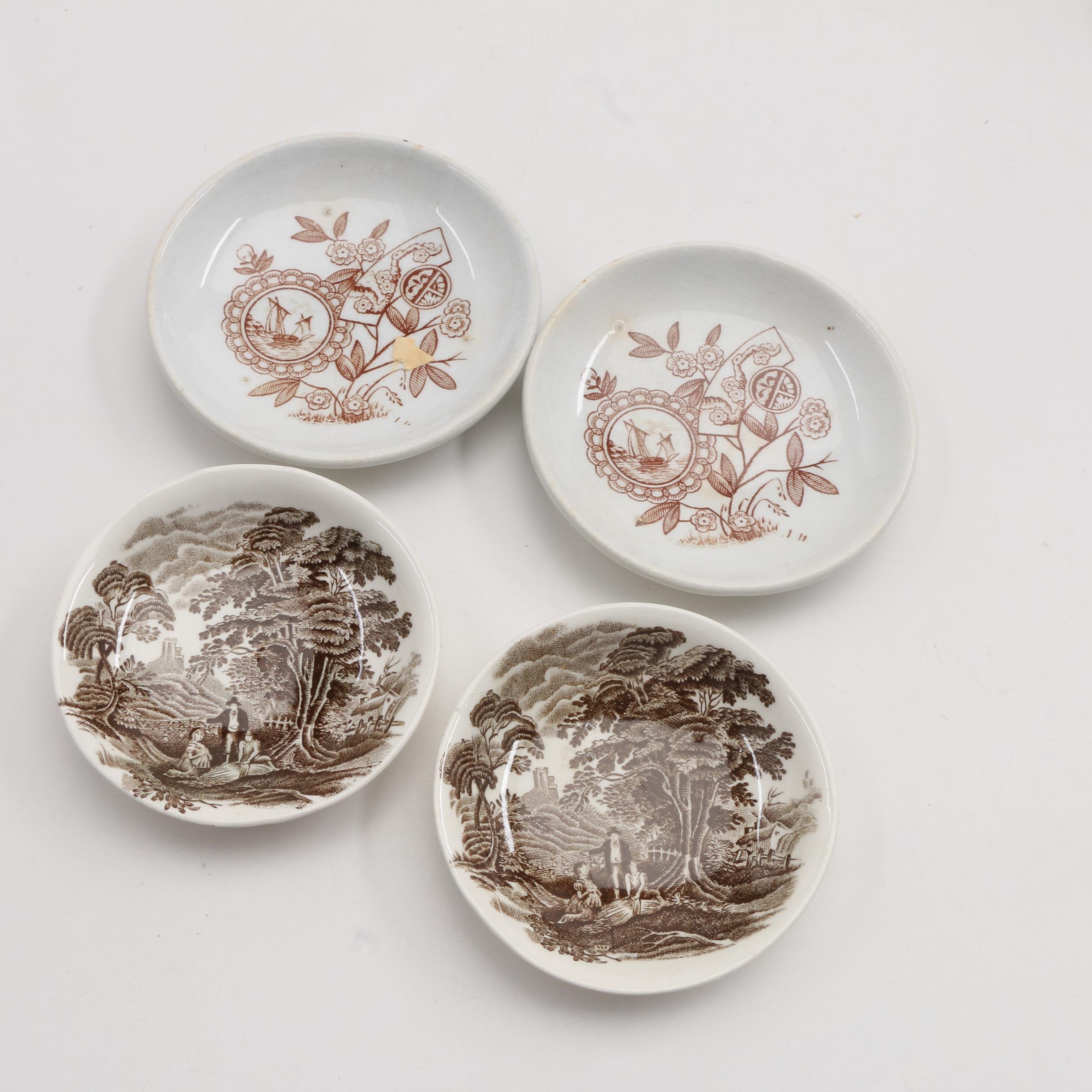 A Collection Of Over 140 Butter Pats