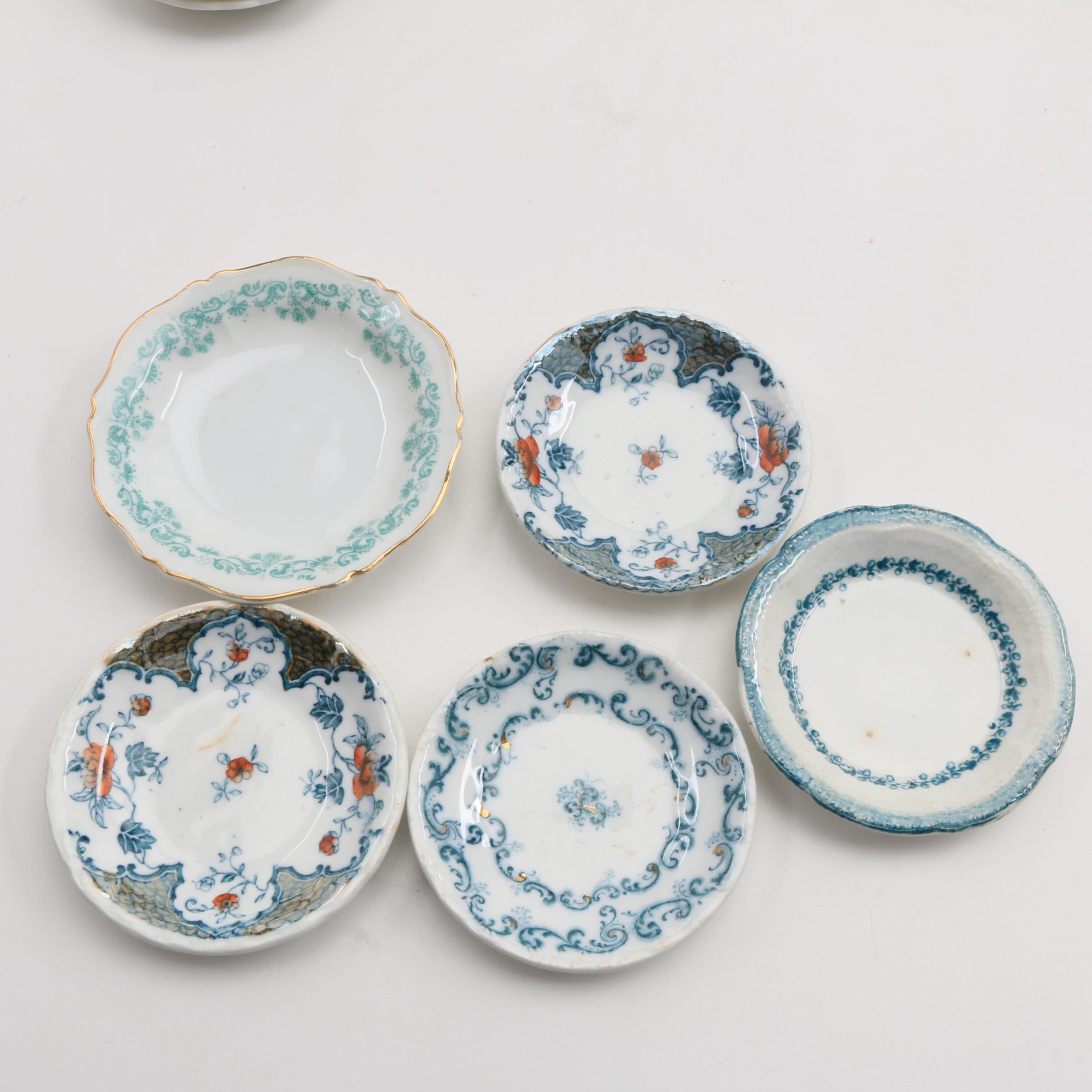 A Collection Of Over 140 Butter Pats