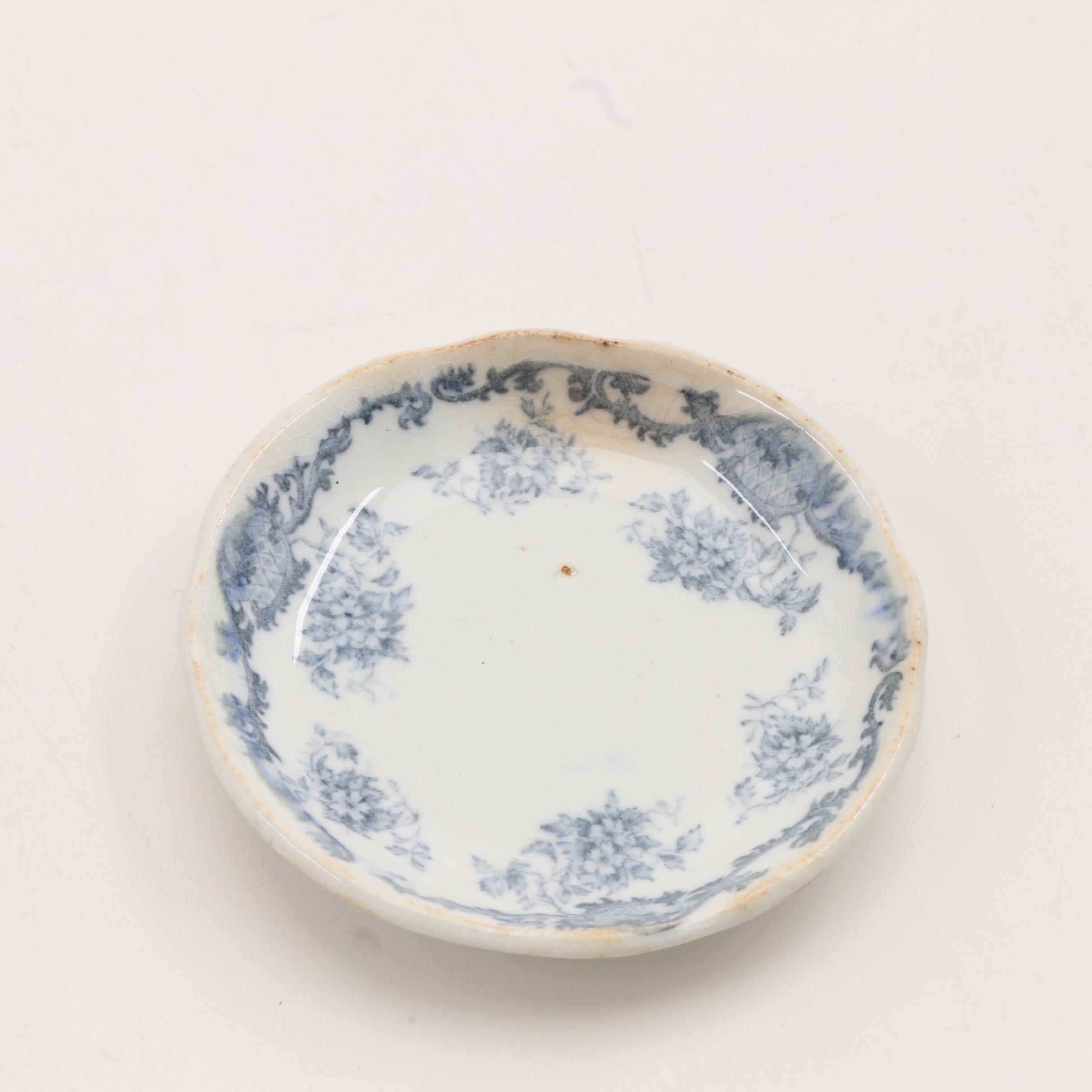 A Collection Of Over 140 Butter Pats