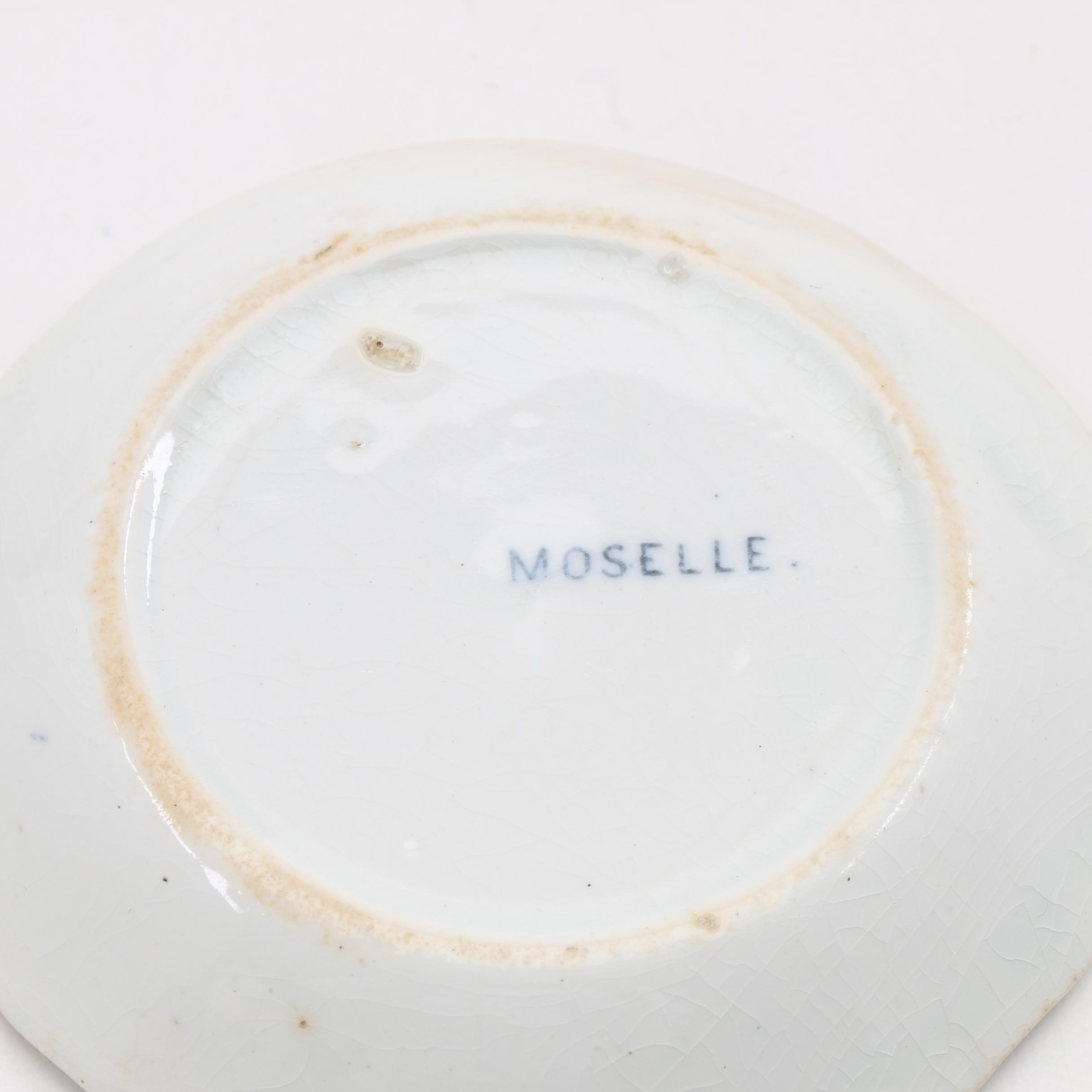 A Collection Of Over 140 Butter Pats