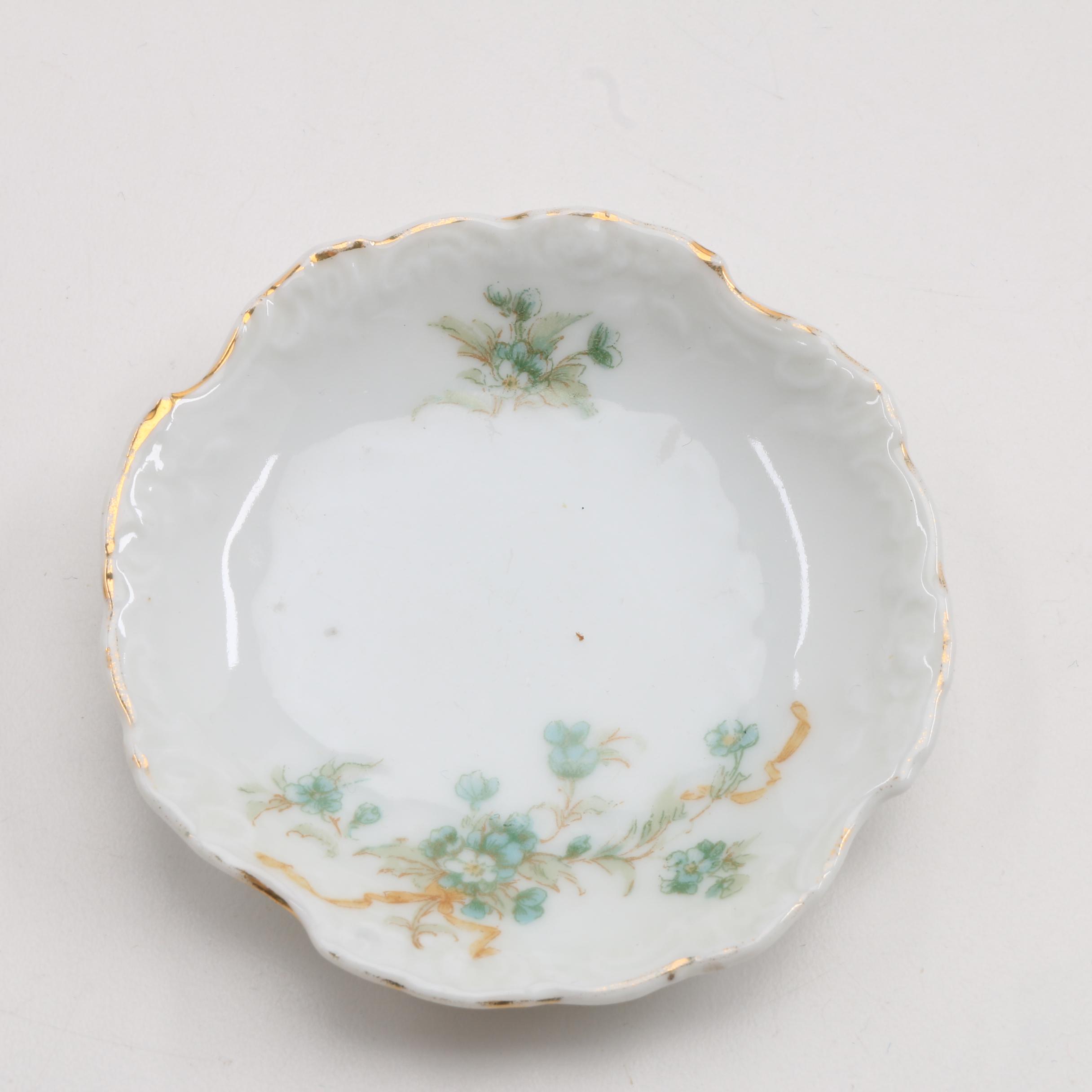 A Collection Of Over 140 Butter Pats