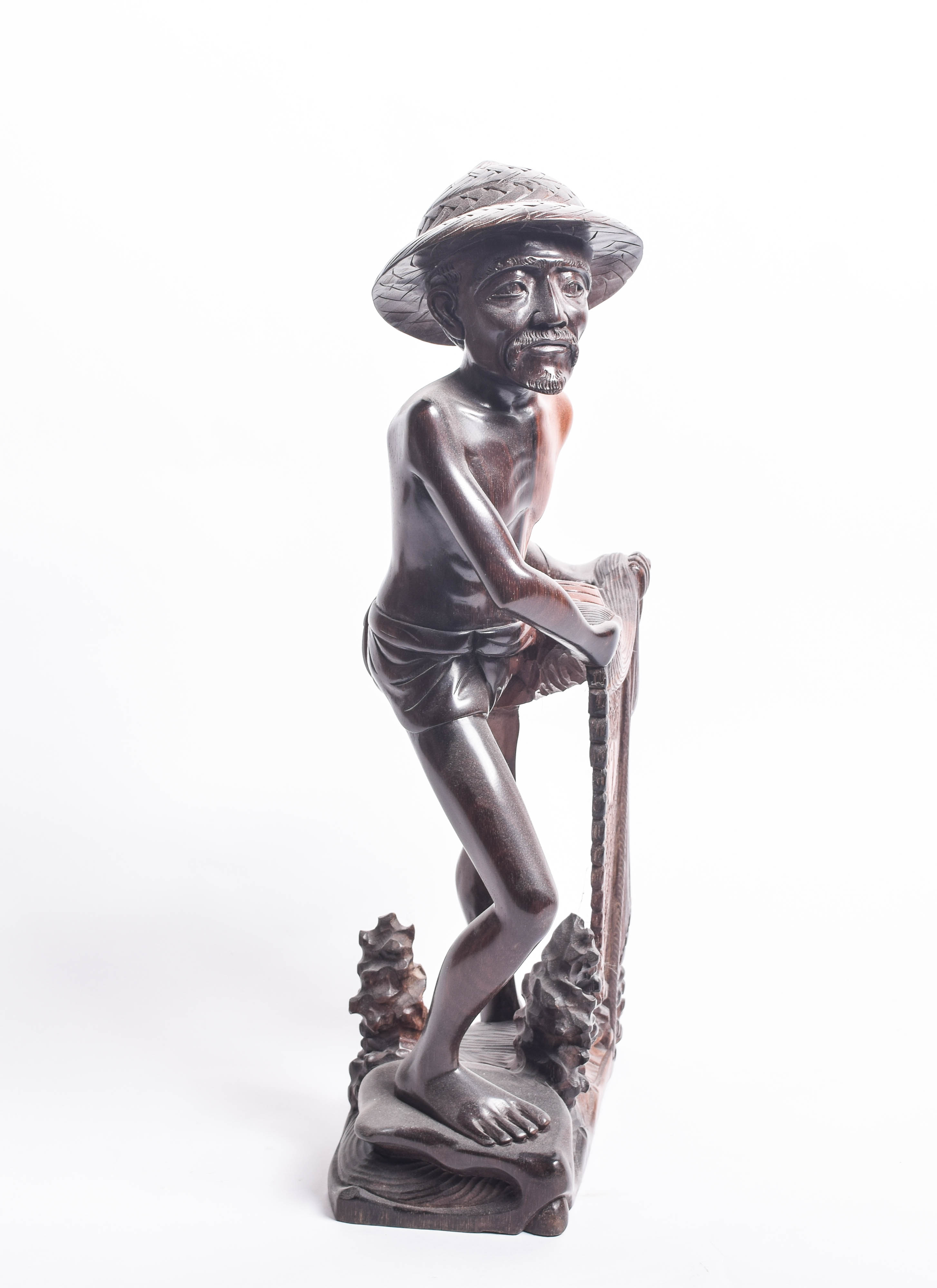 South Asian Wooden Sculpture of a Fisherman