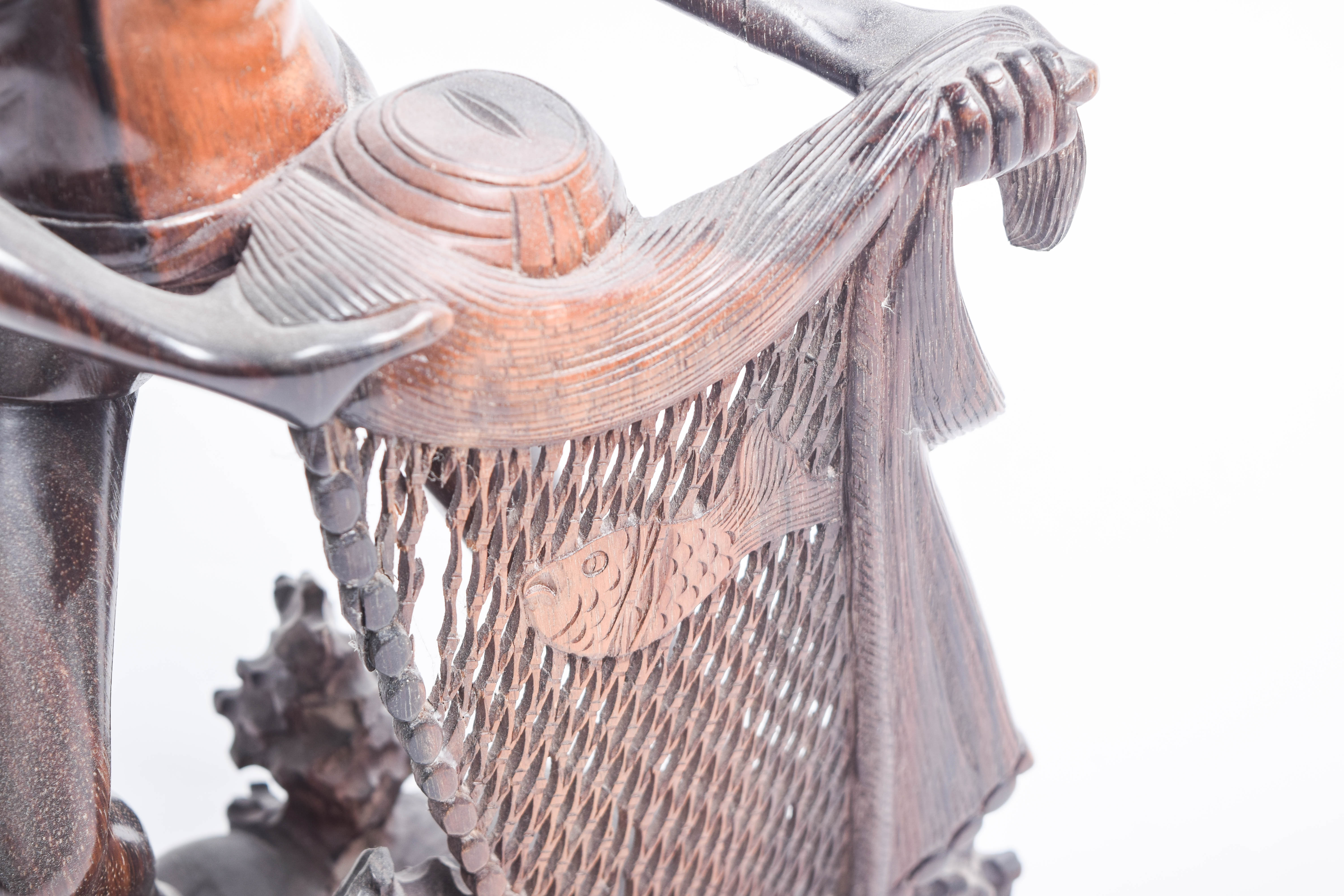 South Asian Wooden Sculpture of a Fisherman