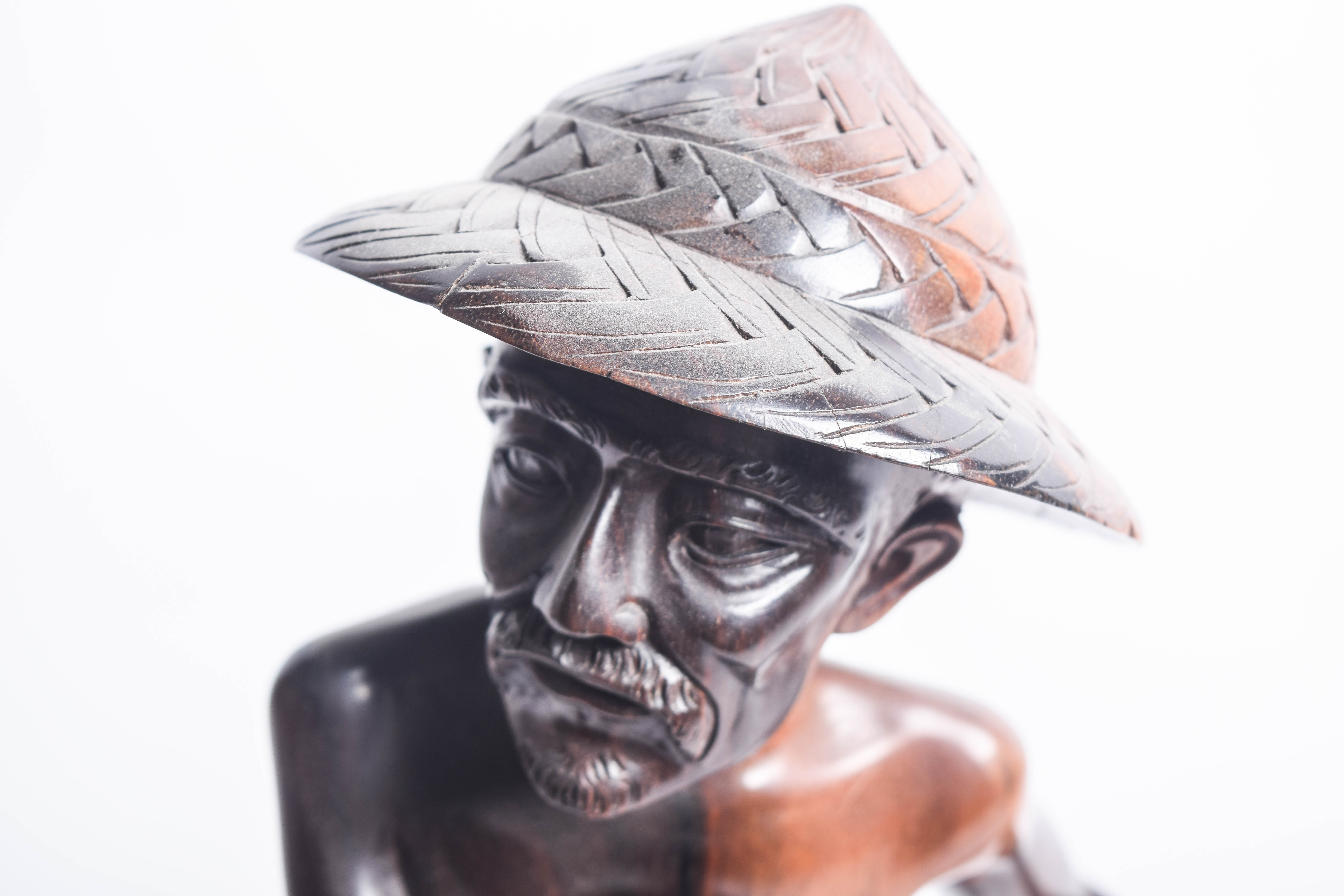 South Asian Wooden Sculpture of a Fisherman