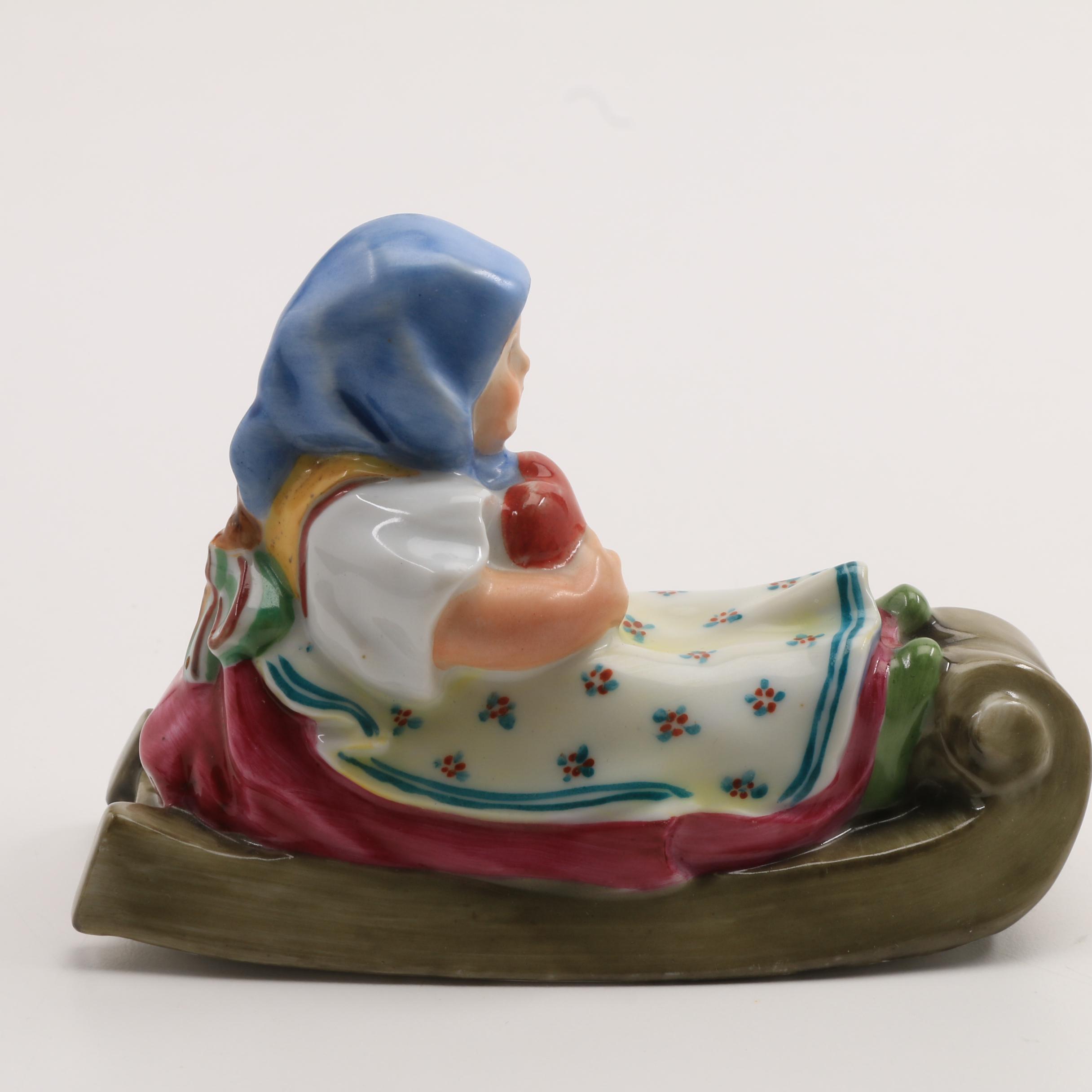 Herend Porcelain Girl On Sled Figurine