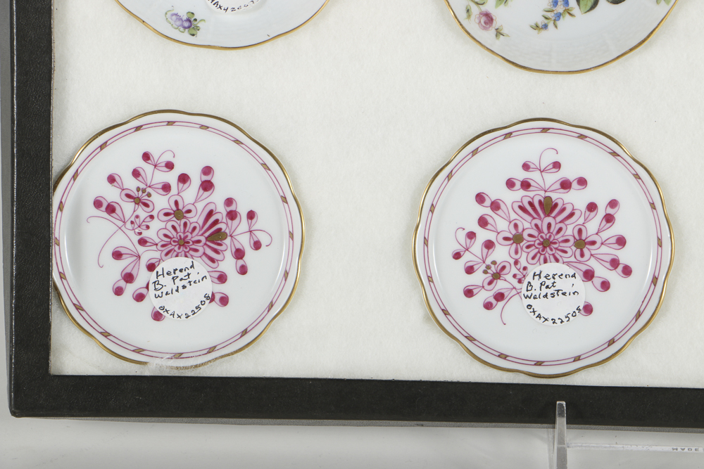 Twelve Herend Porcelain Butter Pats In Glass Top Display Case