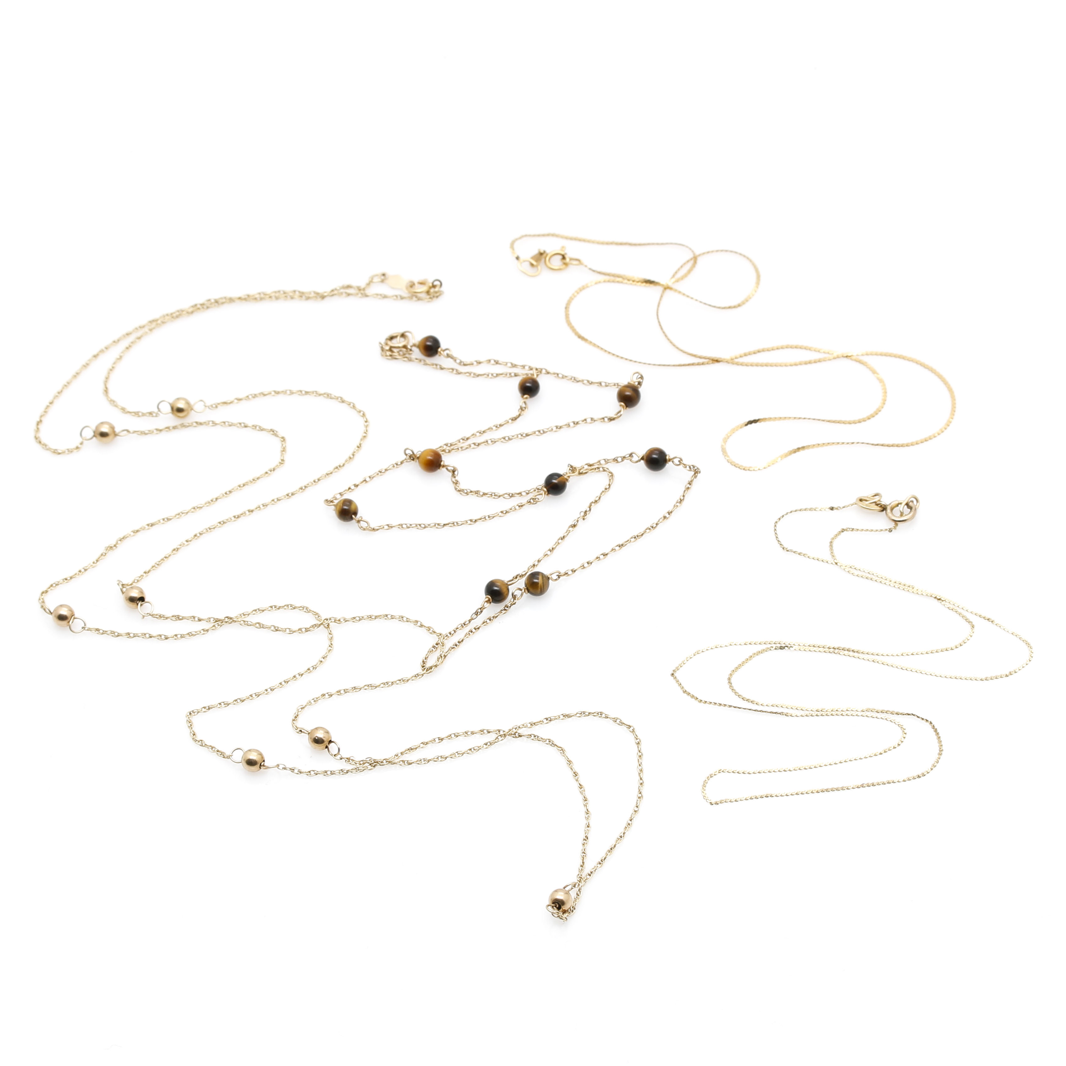 Assortment of 14K Yellow Gold Chain Necklaces Including Tiger's Eye
