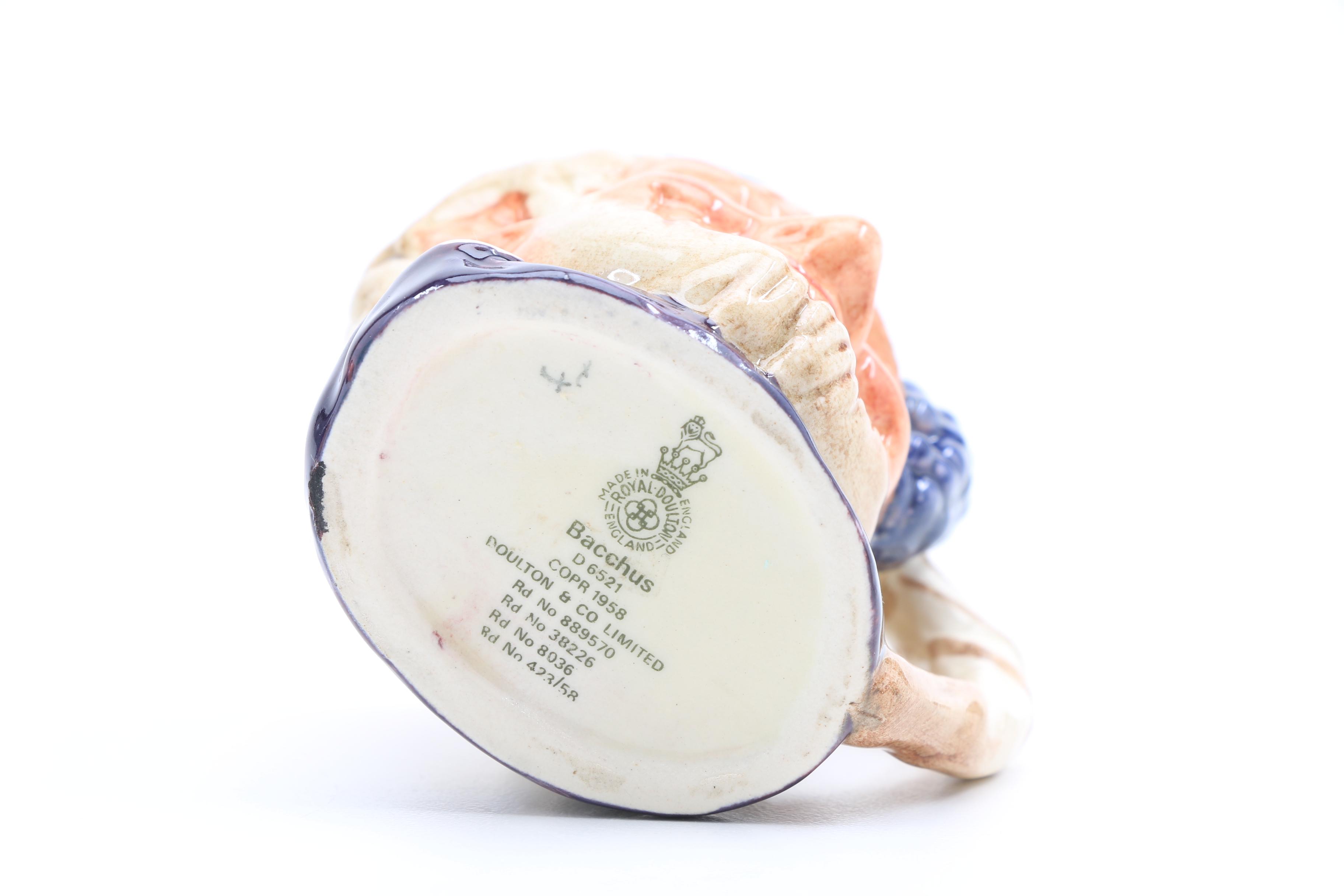 Collection of Nine Vintage Royal Doulton Miniature Character Jugs