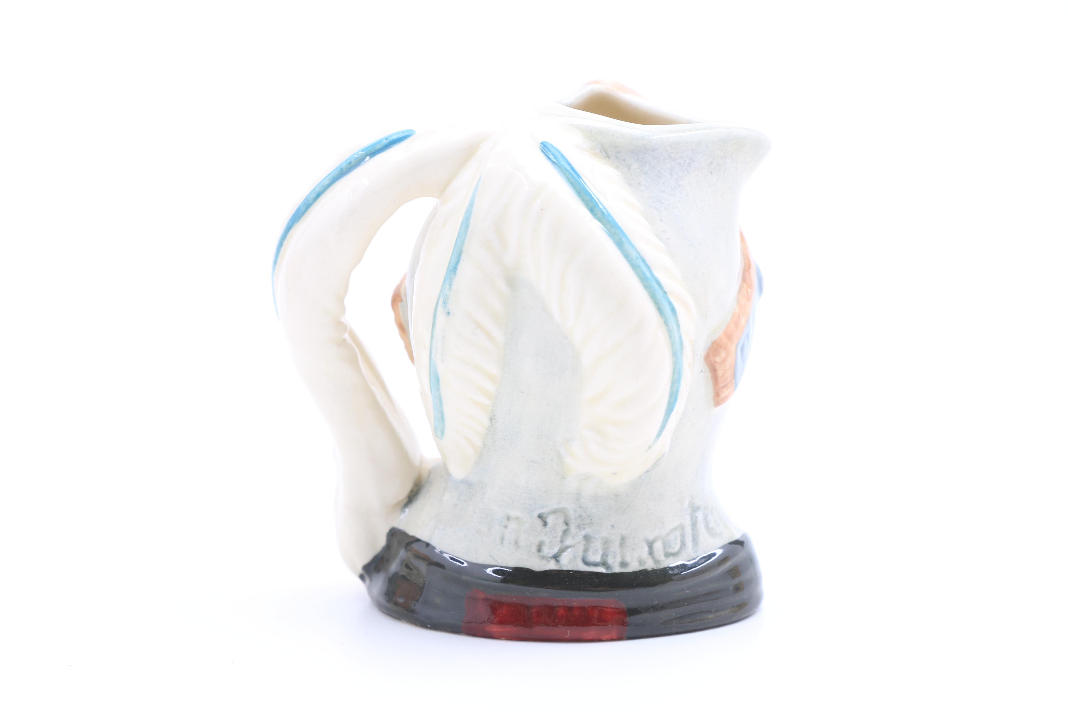 Collection of Nine Vintage Royal Doulton Miniature Character Jugs