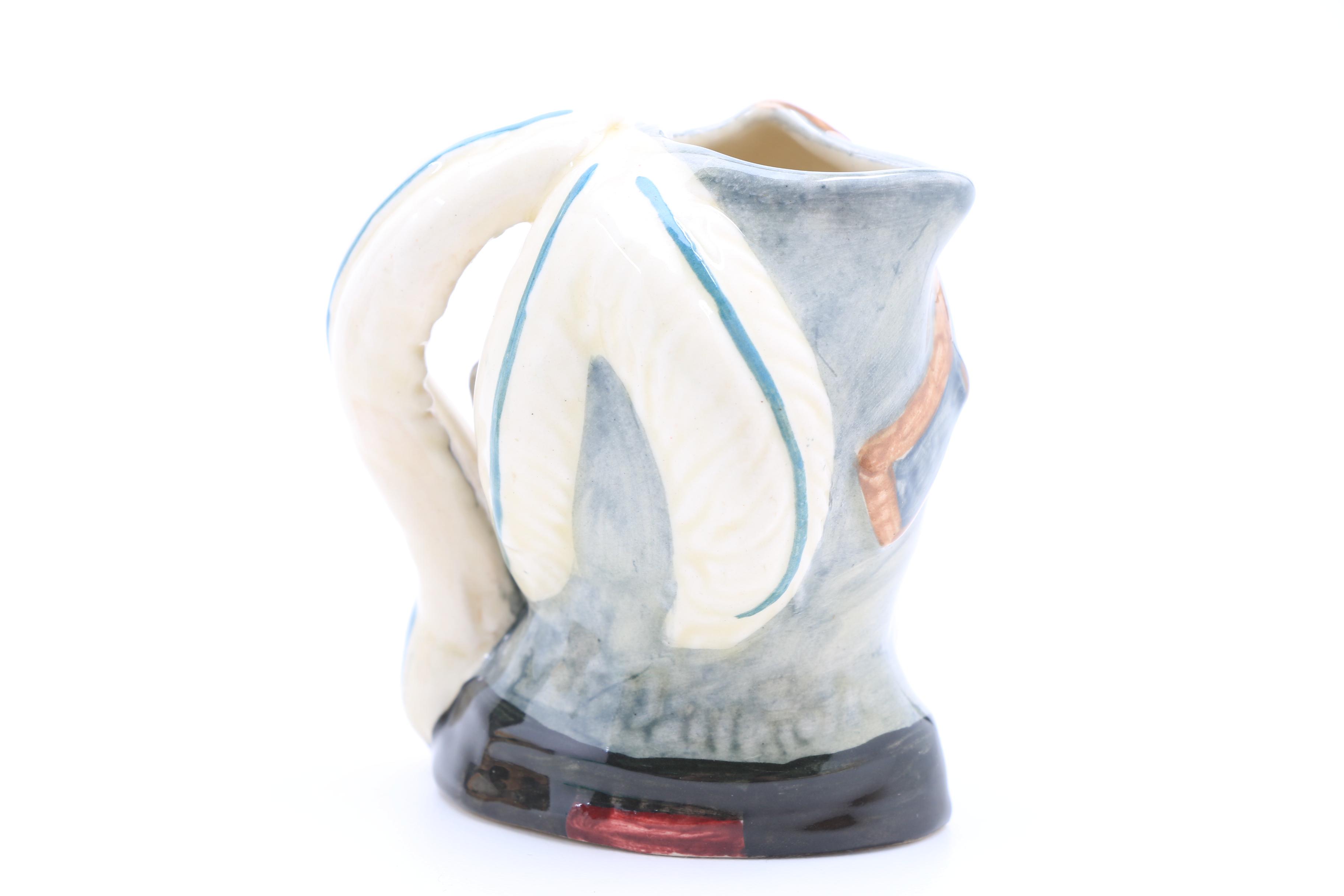 Collection of Nine Vintage Royal Doulton Miniature Character Jugs