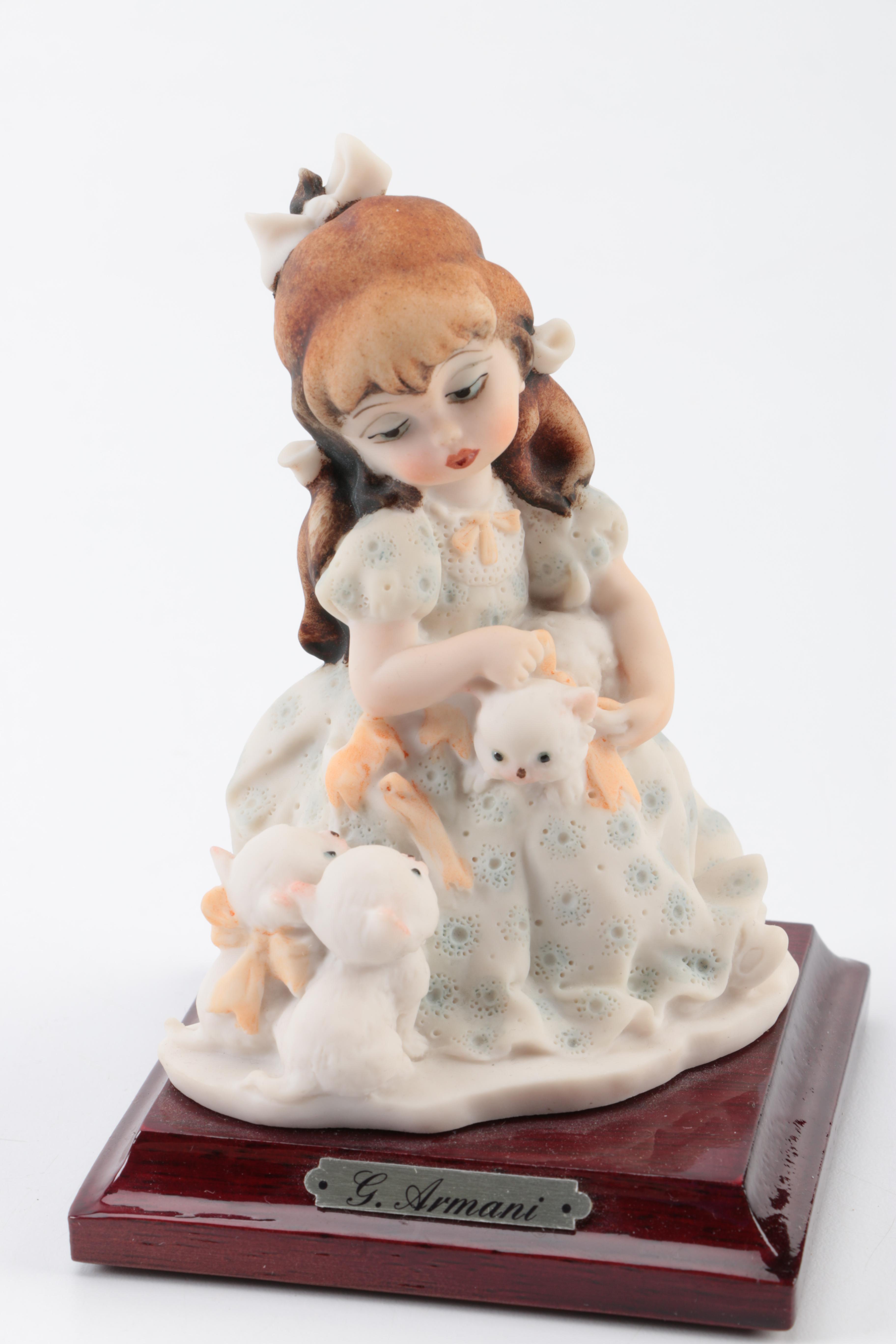 Vintage Ceramic Figurines featuring G. Armani and Norman Rockwell