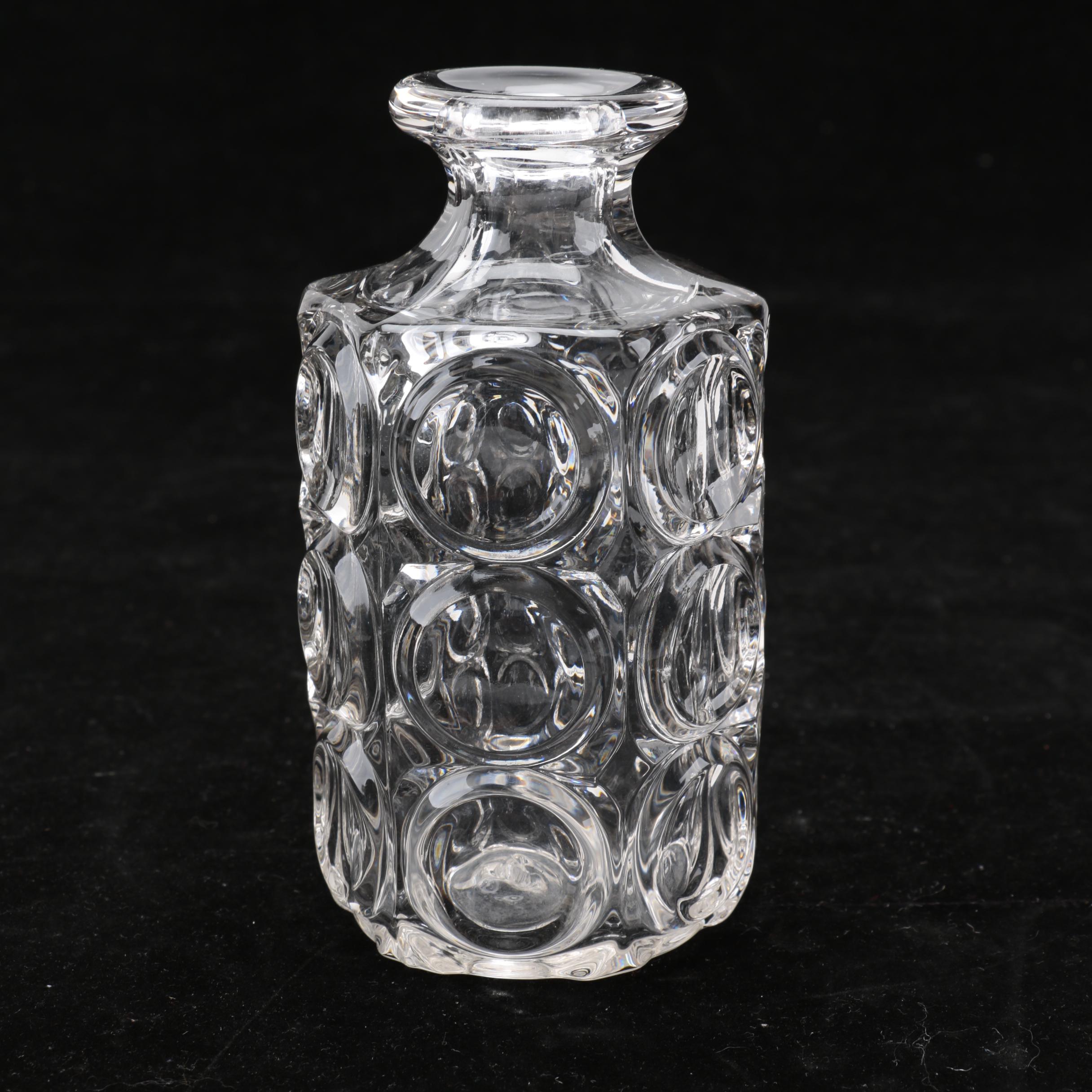 Group of Cut and Molded Glass Decanters with Decorative Stoppers