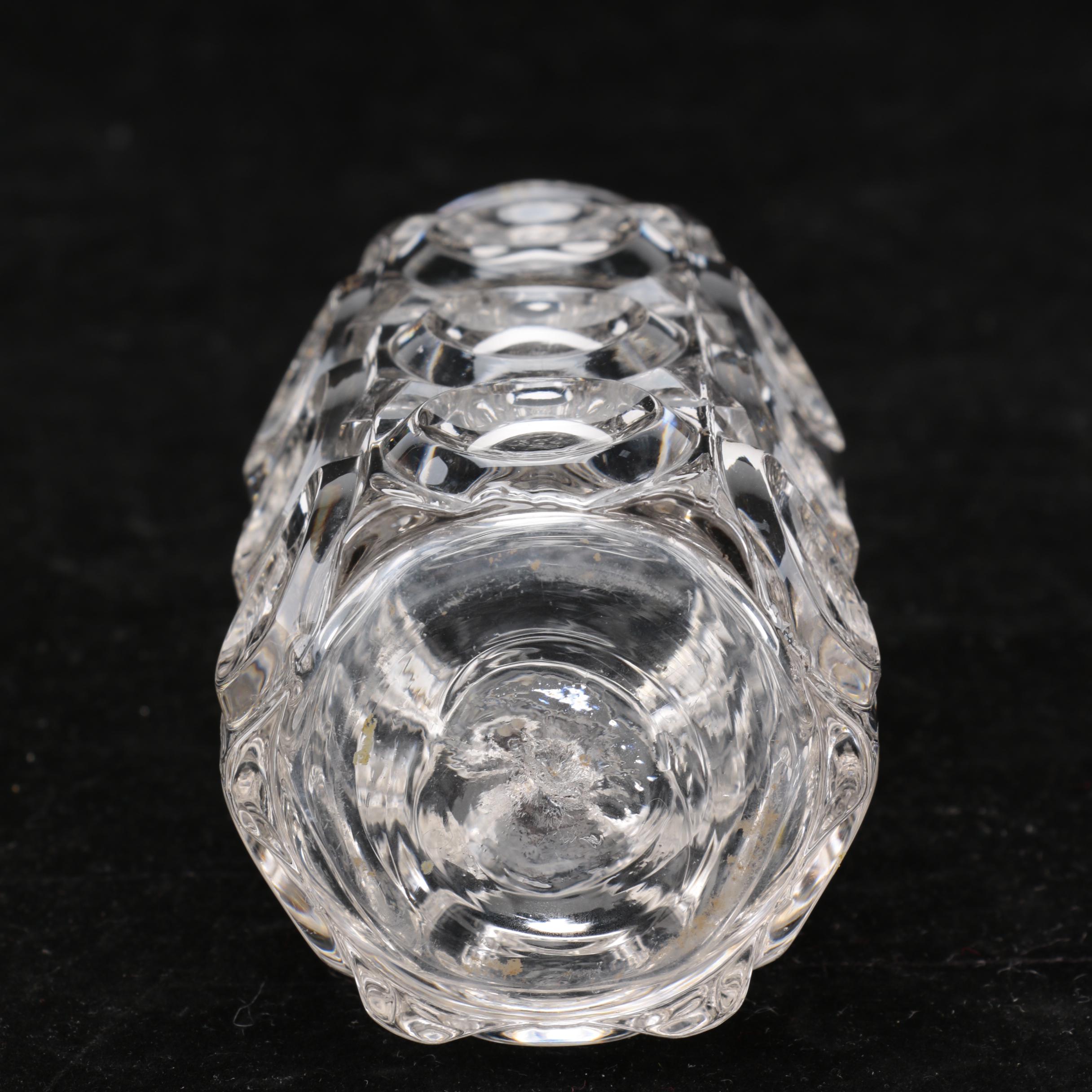 Group of Cut and Molded Glass Decanters with Decorative Stoppers