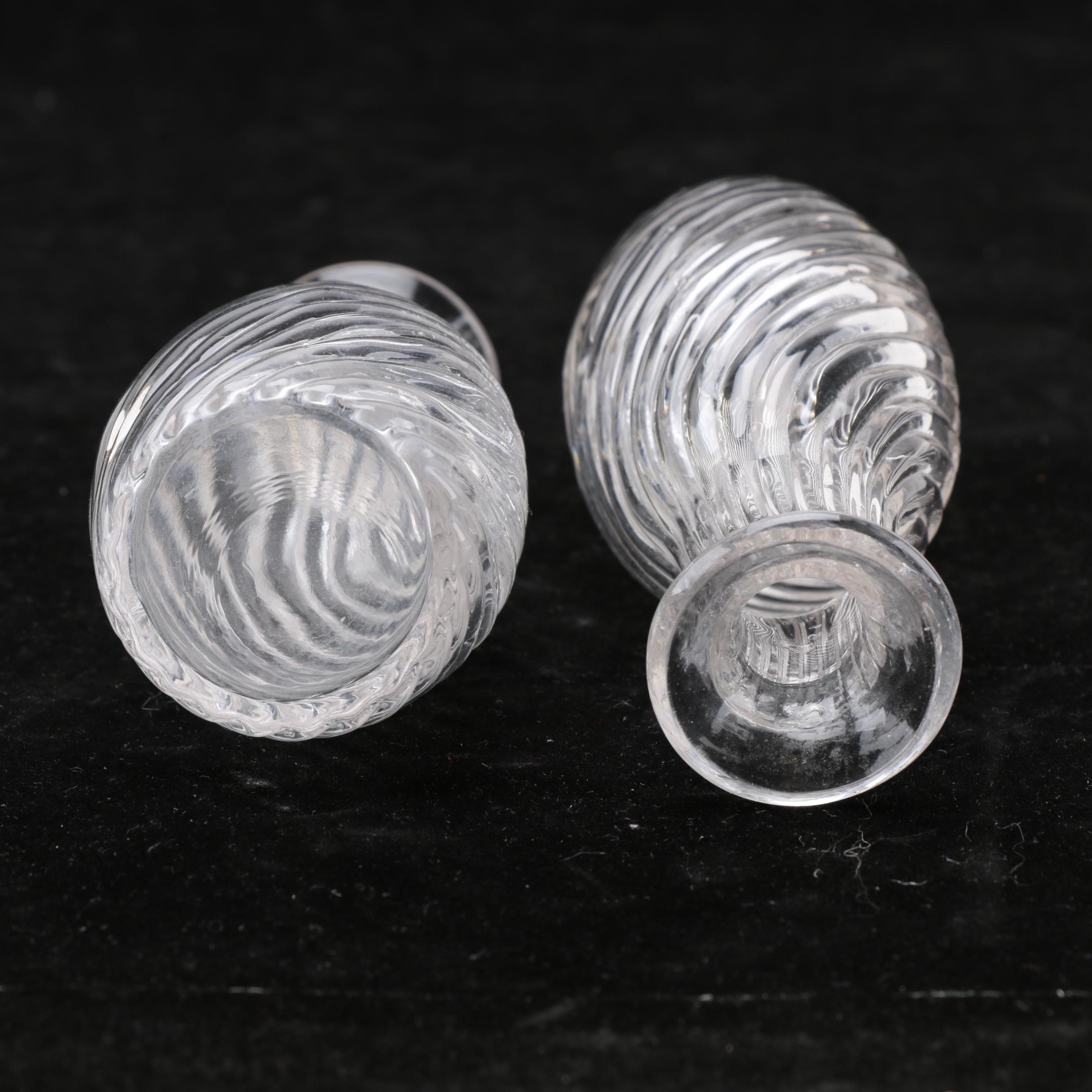 Group of Cut and Molded Glass Decanters with Decorative Stoppers