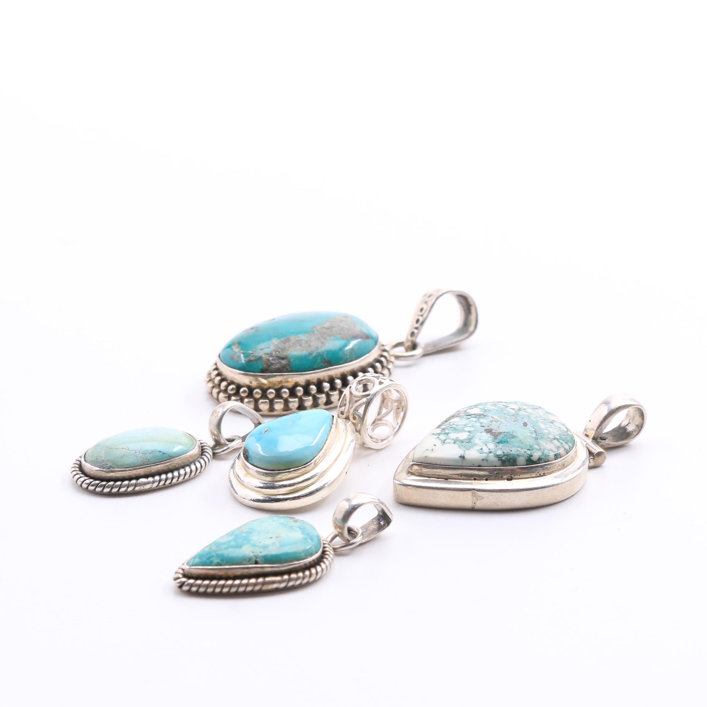 Five Sterling Silver and Turquoise Pendants