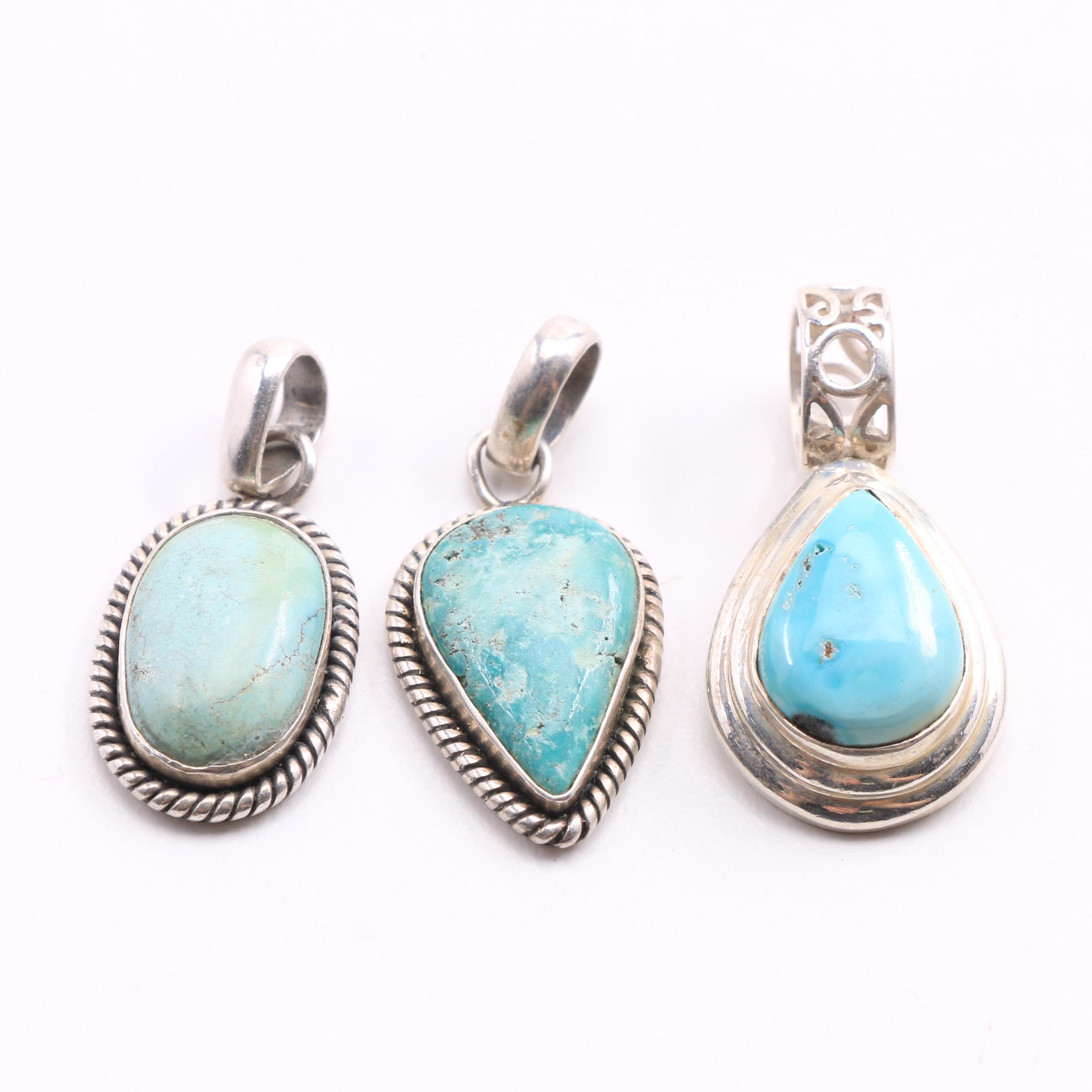 Five Sterling Silver and Turquoise Pendants