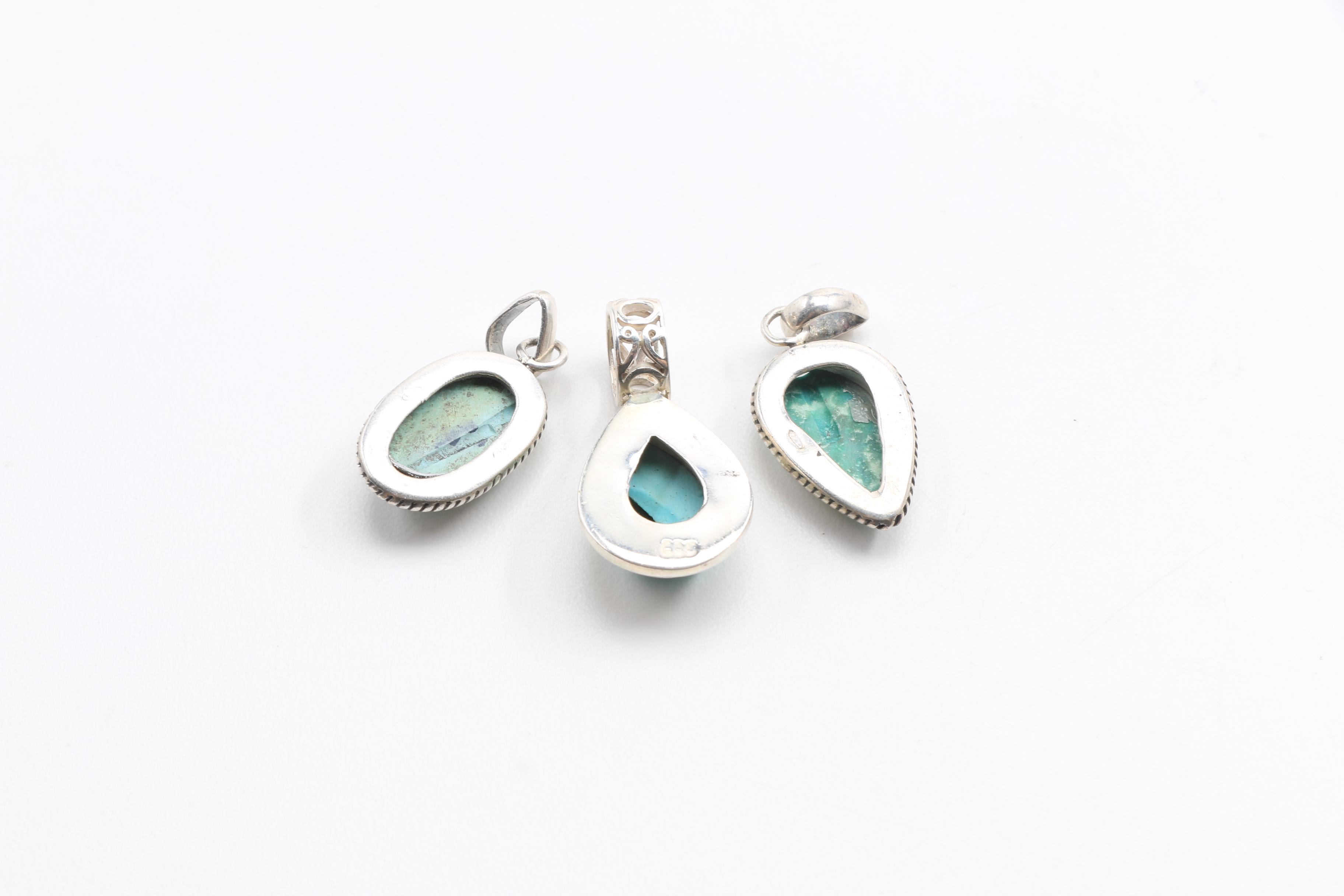Five Sterling Silver and Turquoise Pendants