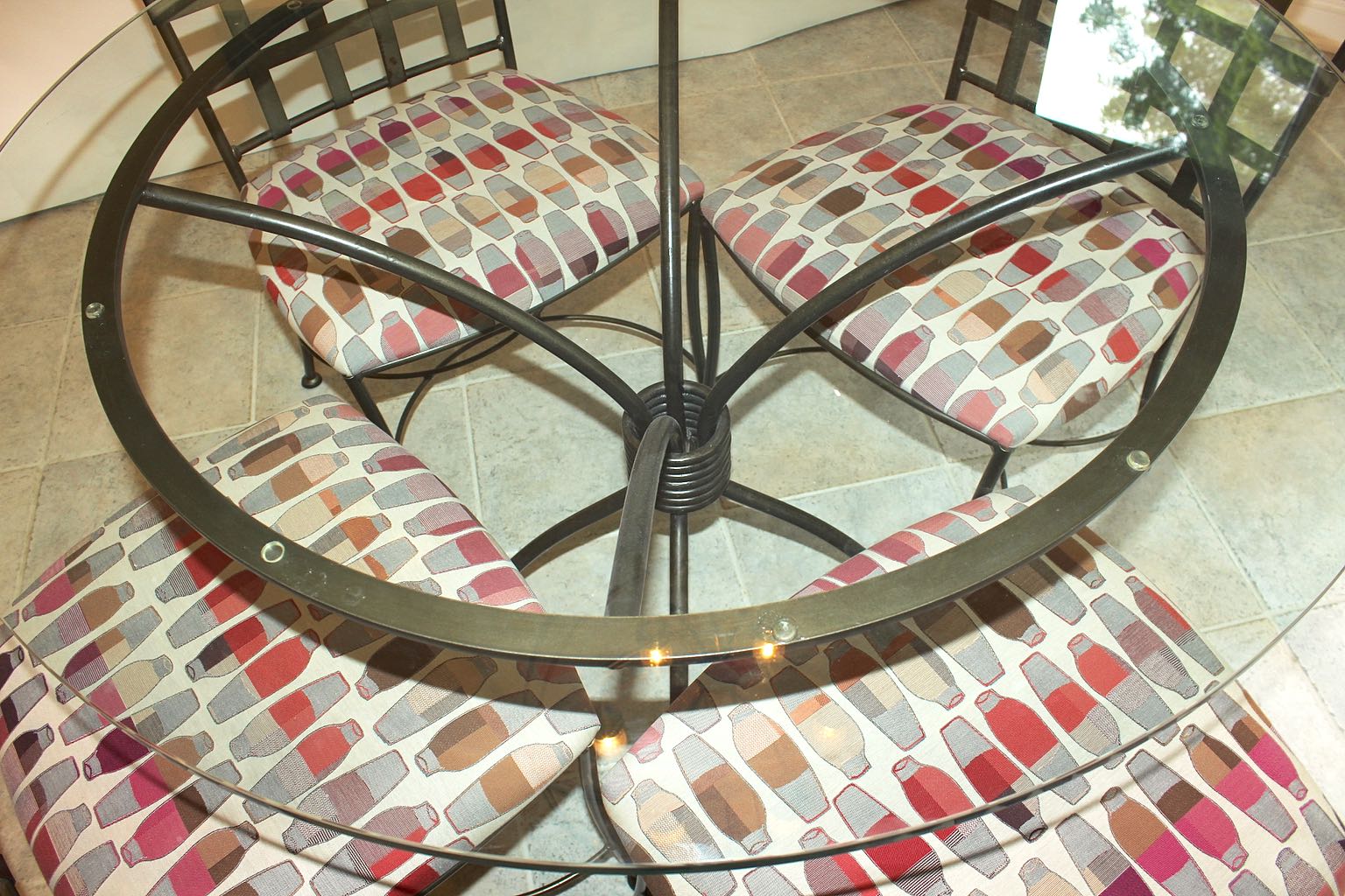 Glass Top Dining Table with Four Wrought Iron Chairs