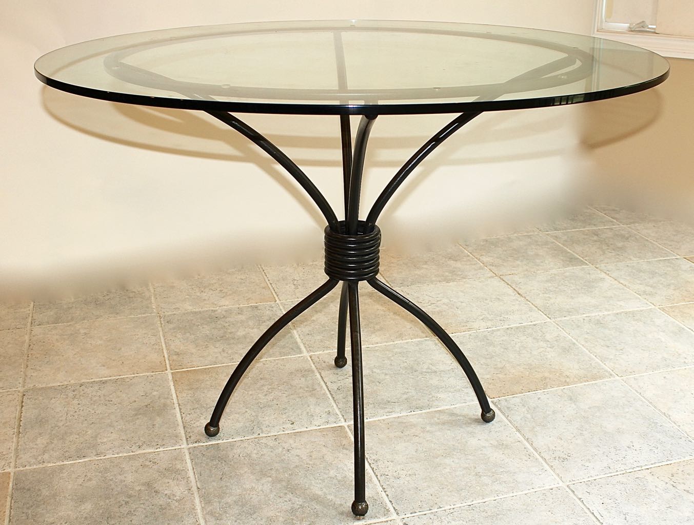 Glass Top Dining Table with Four Wrought Iron Chairs