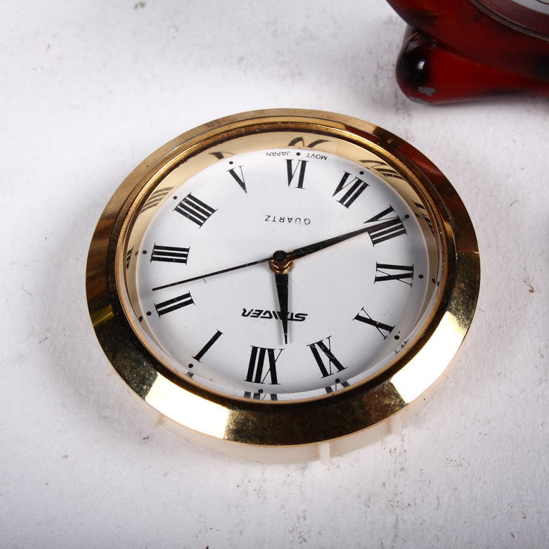 Collection of Clocks and Temperature Gauges